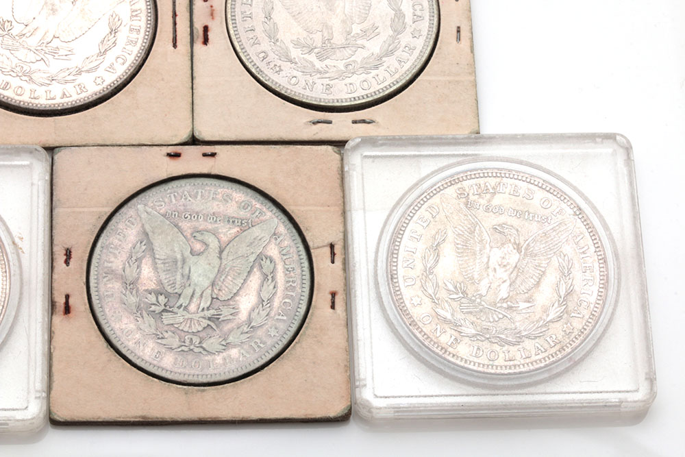 Group of Five Silver Morgan Dollars Including the Following: 1884, 1886, and three 1921