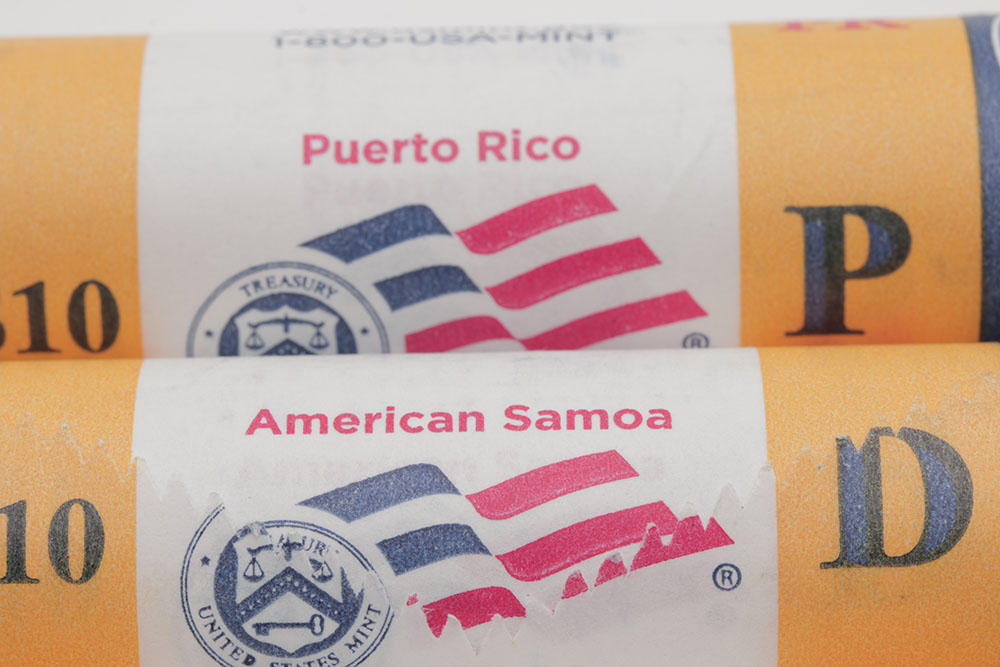 Group of Eight U.S. Mint Rolls of 2009 Quarters