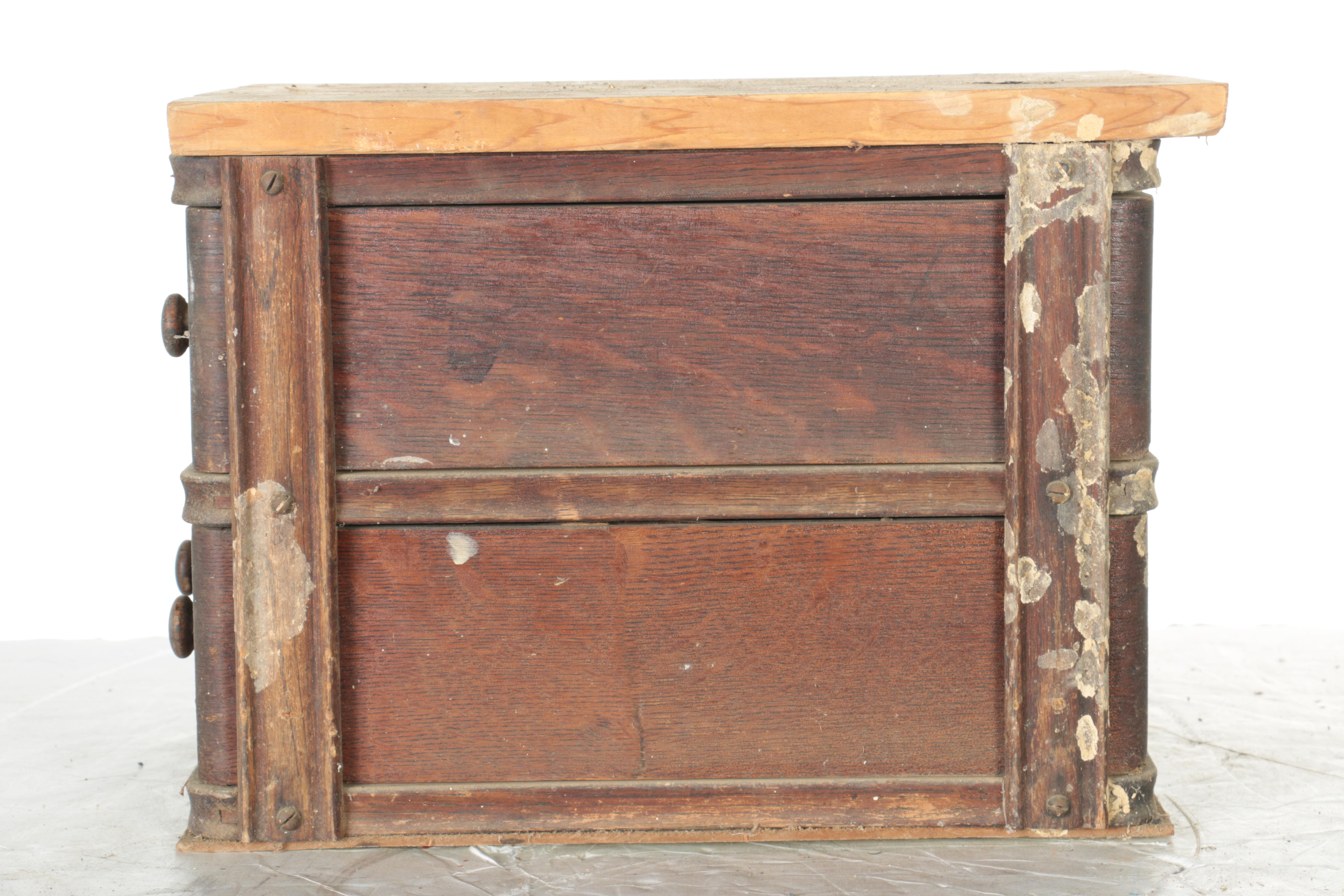 Oak Four-Drawer Chest With Cable Driven Tie-Down