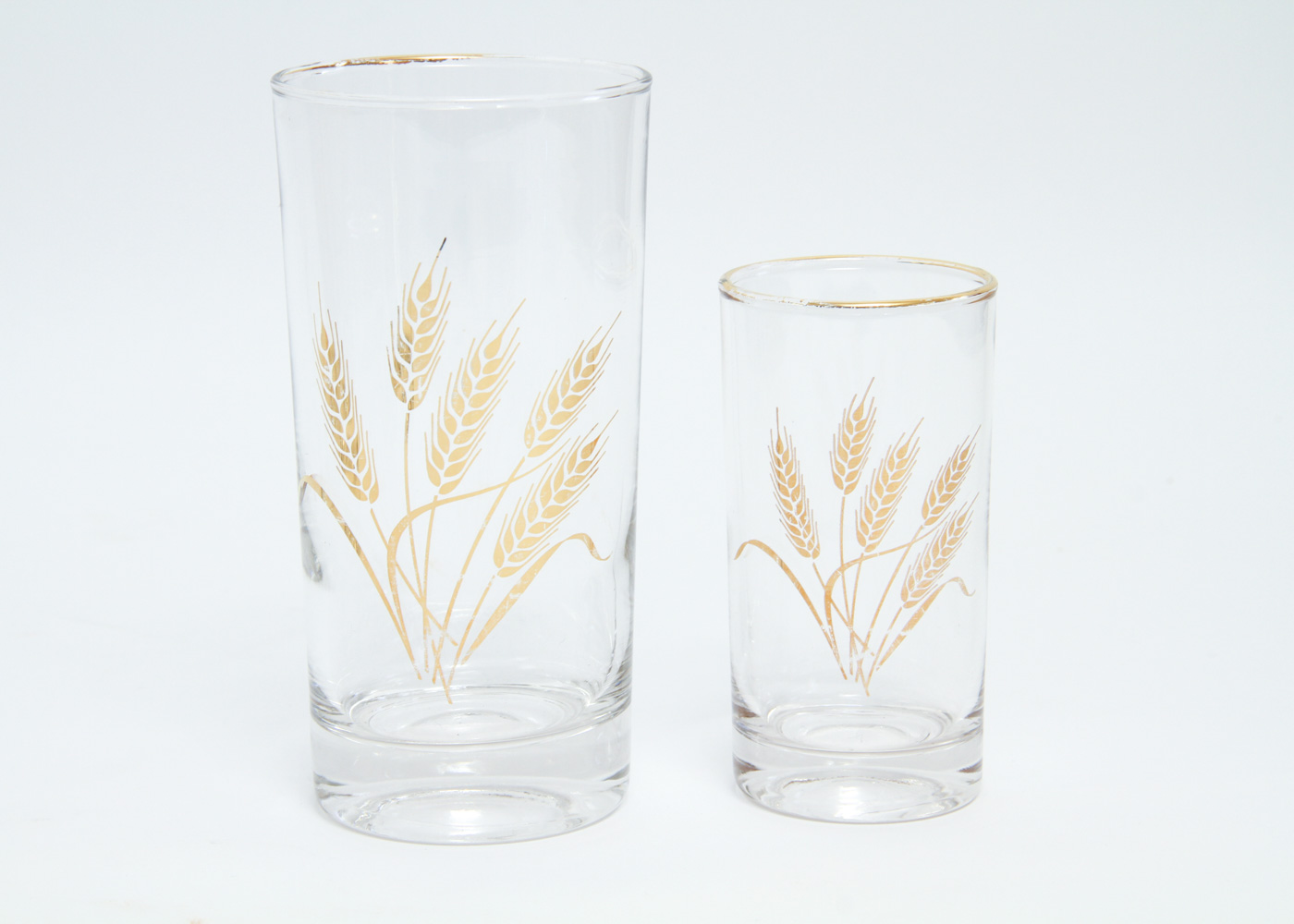 Collection of Eleven Mid-Century Drinking Glasses with a Gold Tone Wheat Motif