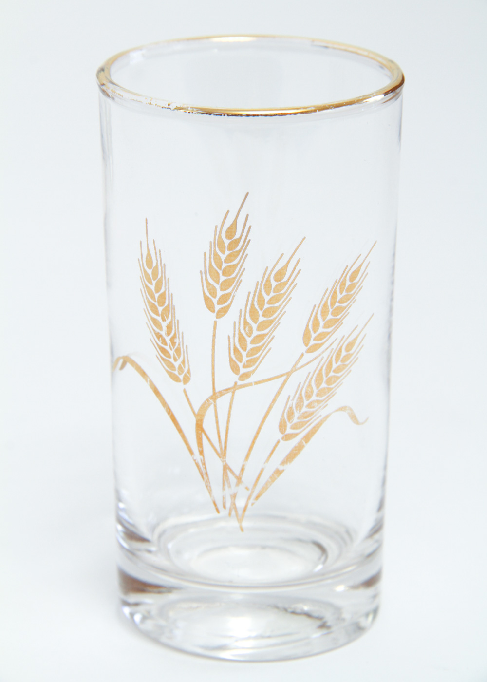 Collection of Eleven Mid-Century Drinking Glasses with a Gold Tone Wheat Motif
