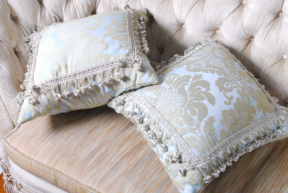 Tufted Beige Love Seat With Fringe