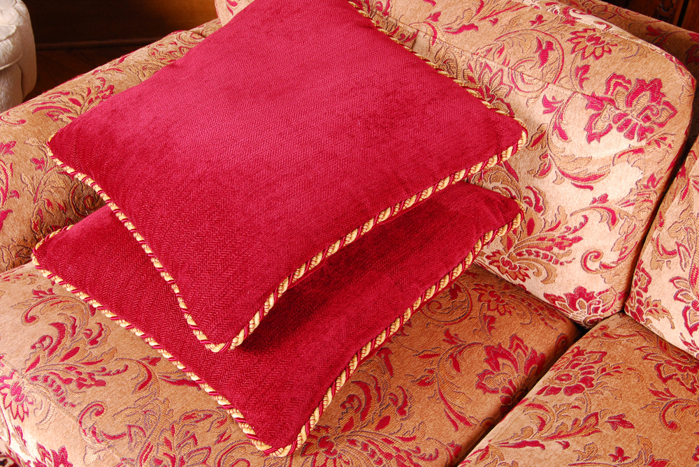 Overstuffed Upholstered Love Seat With Throw Pillows