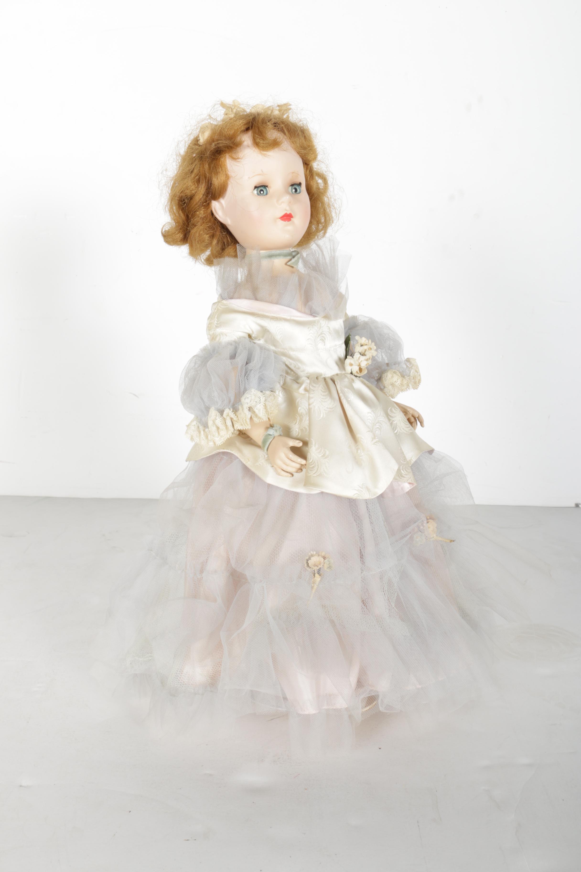 Hard Plastic Doll with Wooden Chest