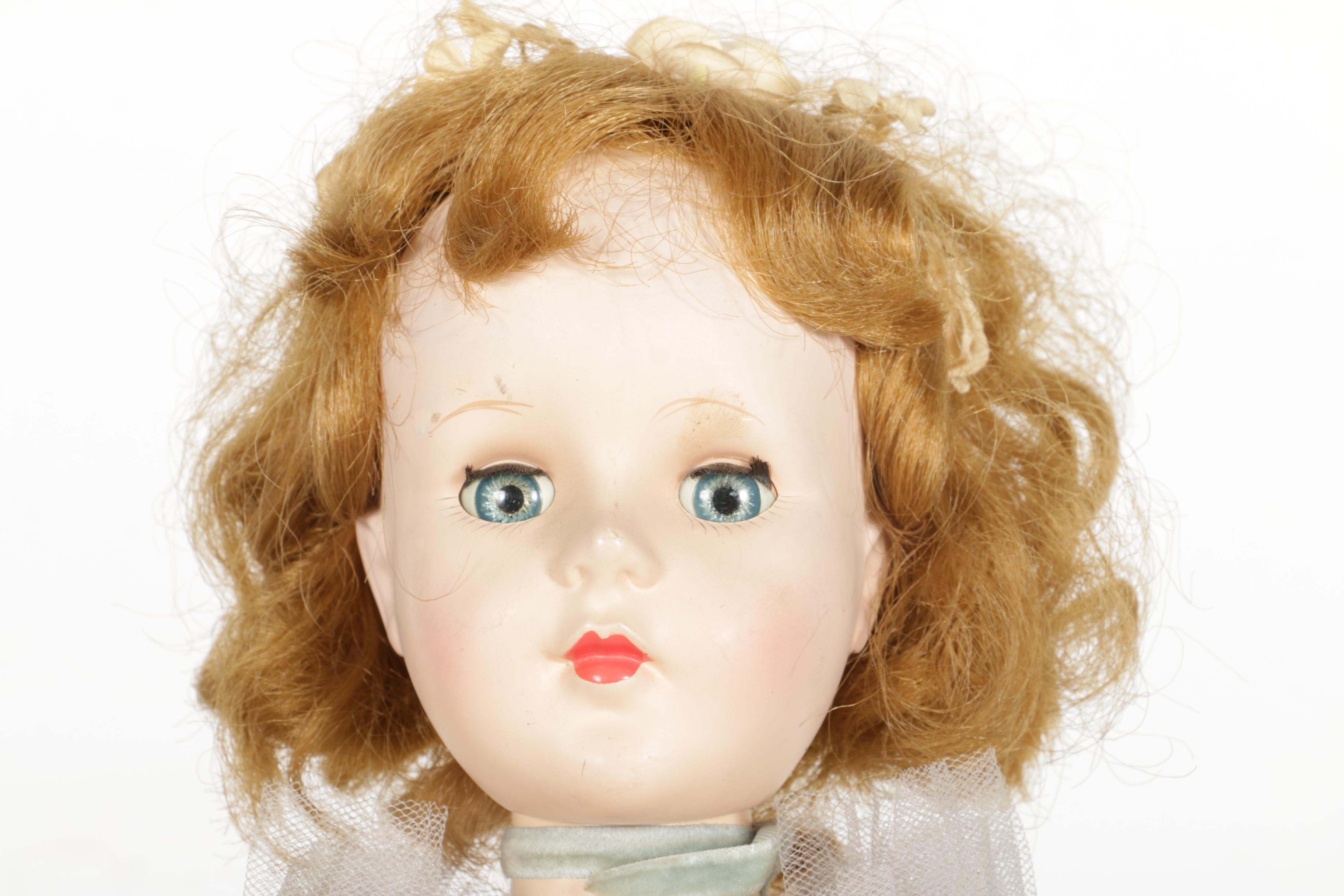 Hard Plastic Doll with Wooden Chest