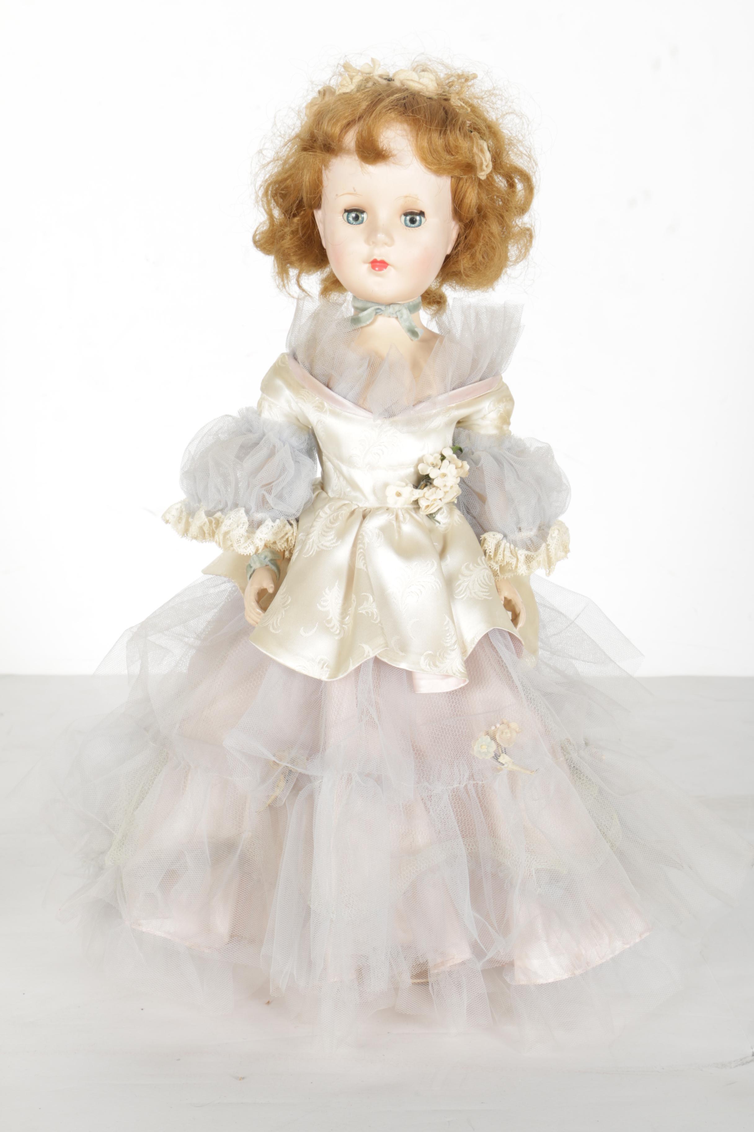 Hard Plastic Doll with Wooden Chest
