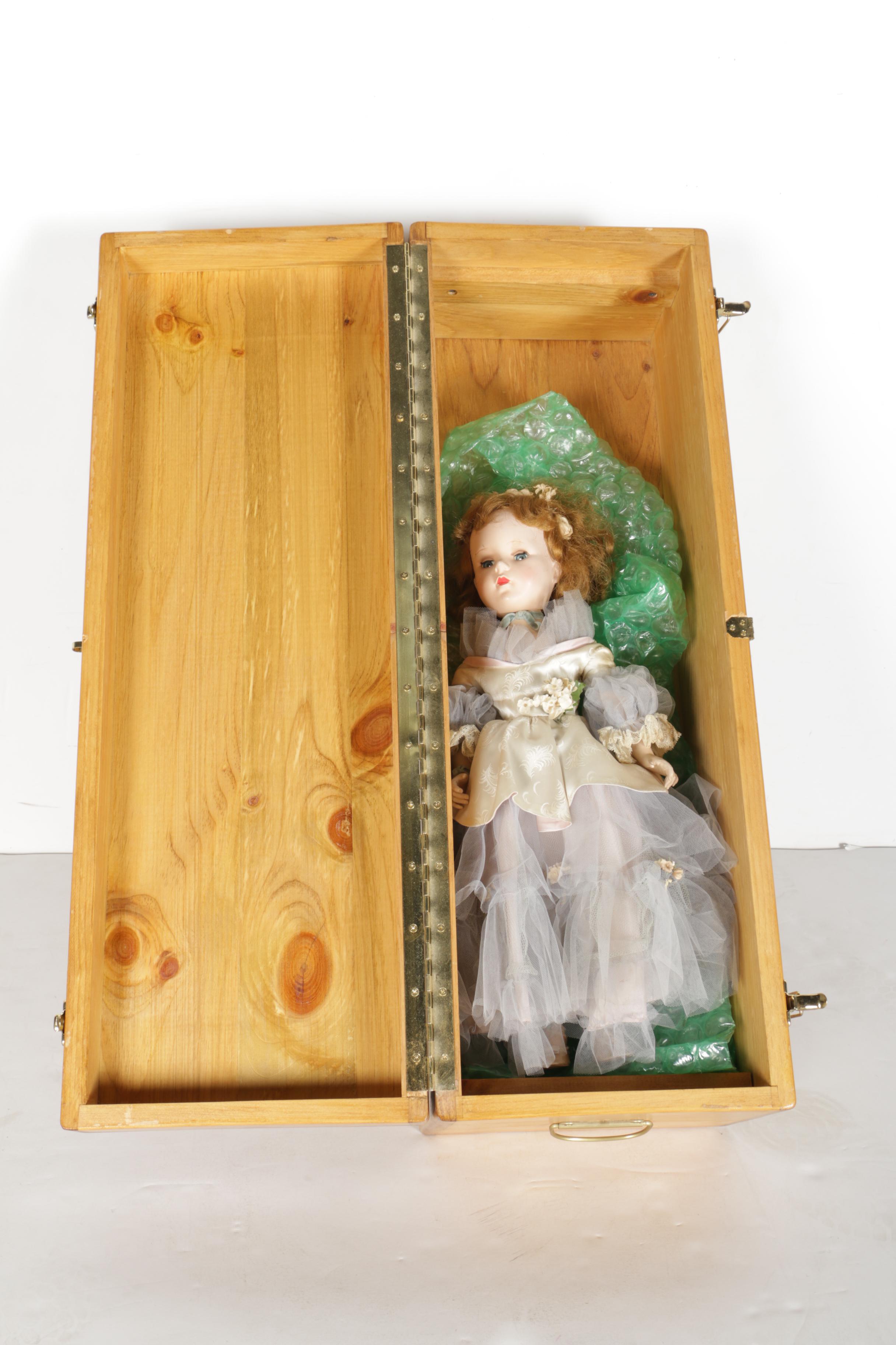 Hard Plastic Doll with Wooden Chest