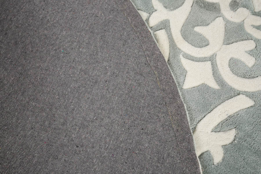 Surya "Cosmopolitan" Circular Wool Area Rug