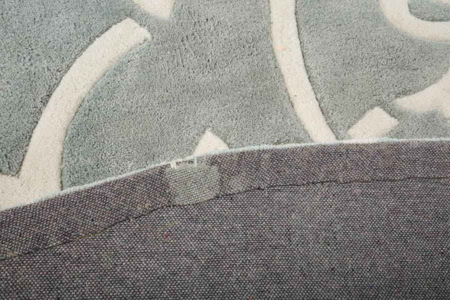 Surya "Cosmopolitan" Circular Wool Area Rug