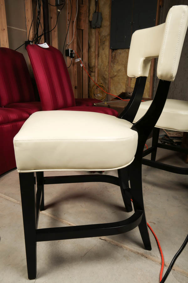 Four Black and Cream Faux Leather Bar Stools