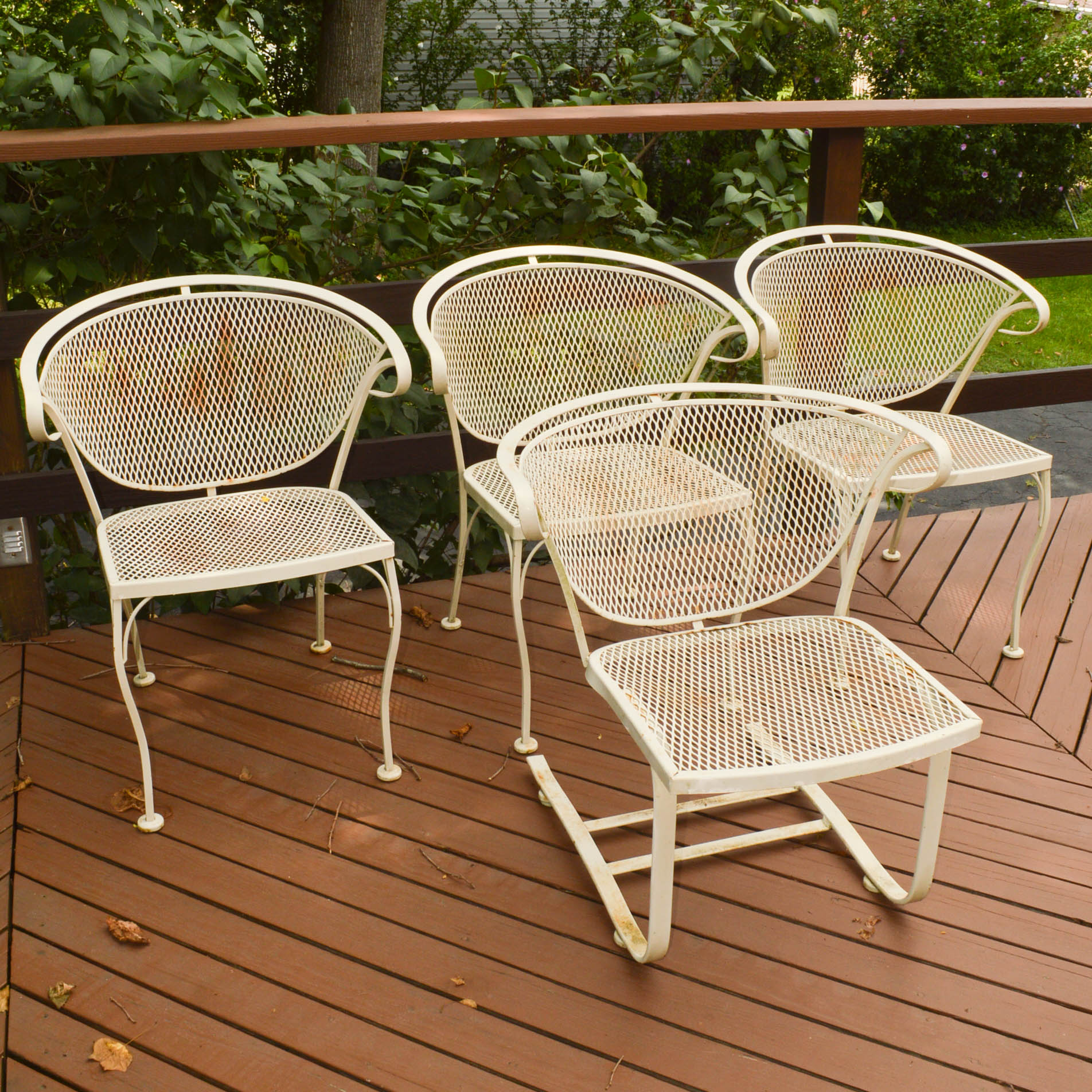Four Mid-Century Wrought Iron Patio Chairs