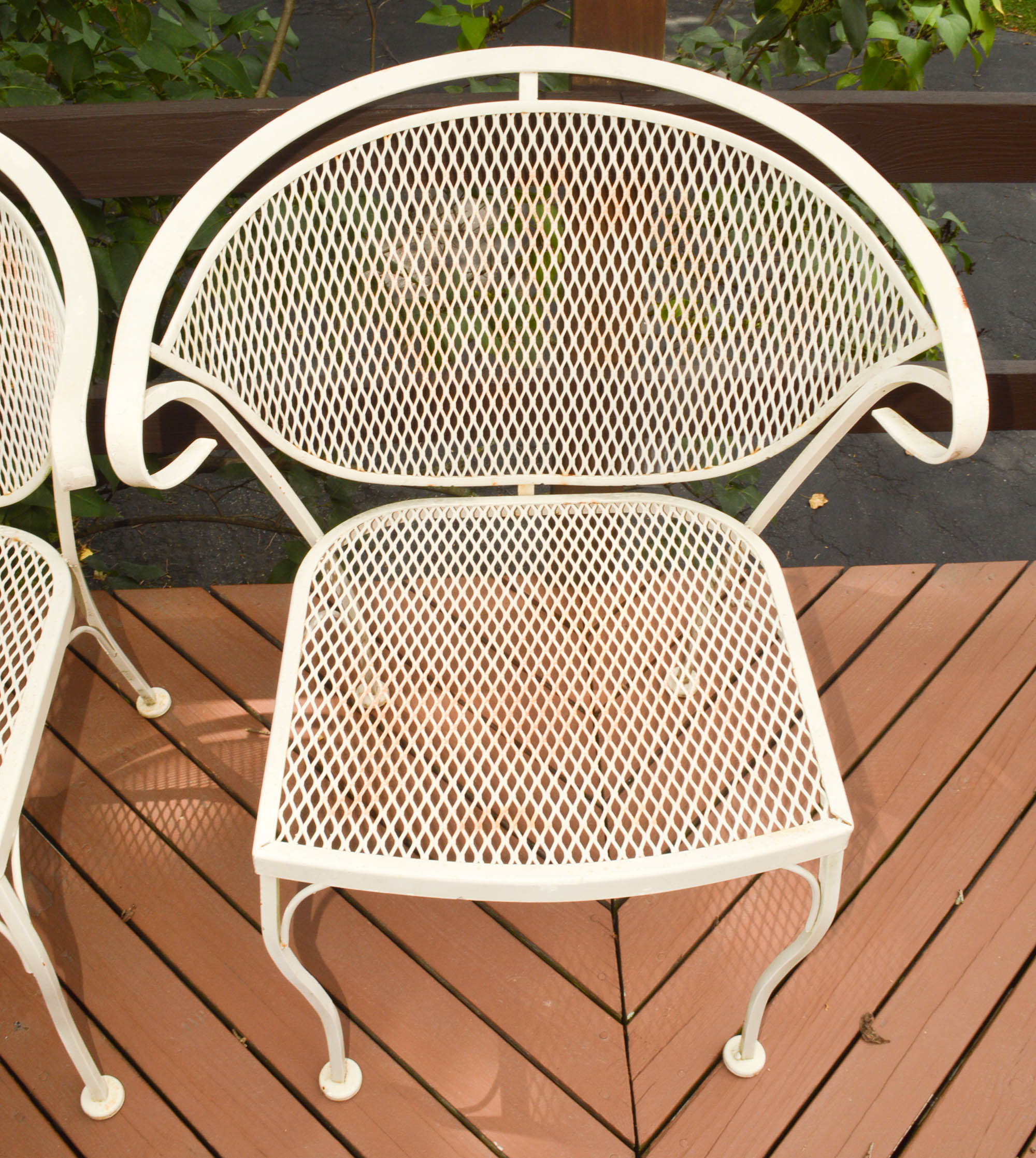 Four Mid-Century Wrought Iron Patio Chairs