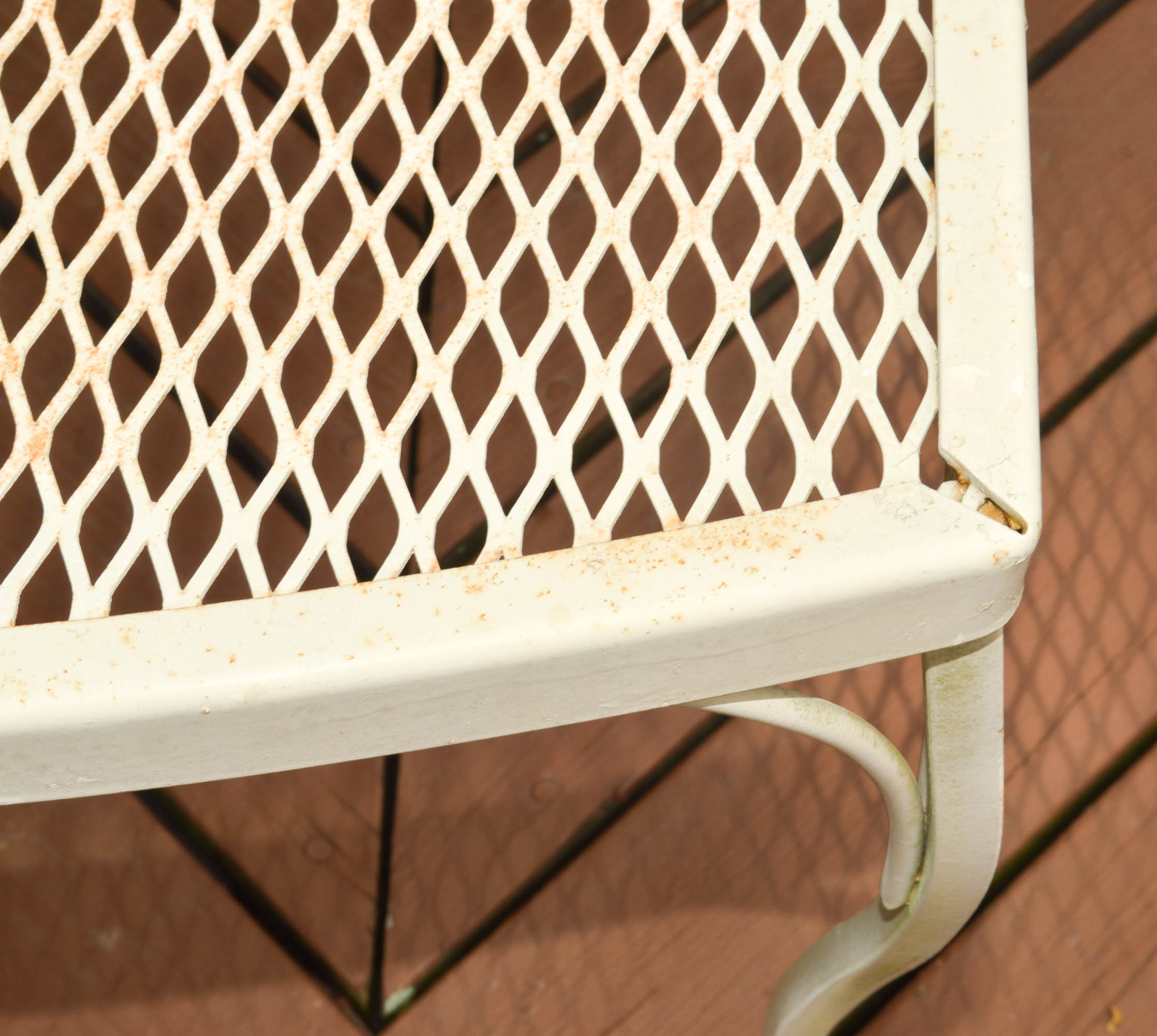 Four Mid-Century Wrought Iron Patio Chairs