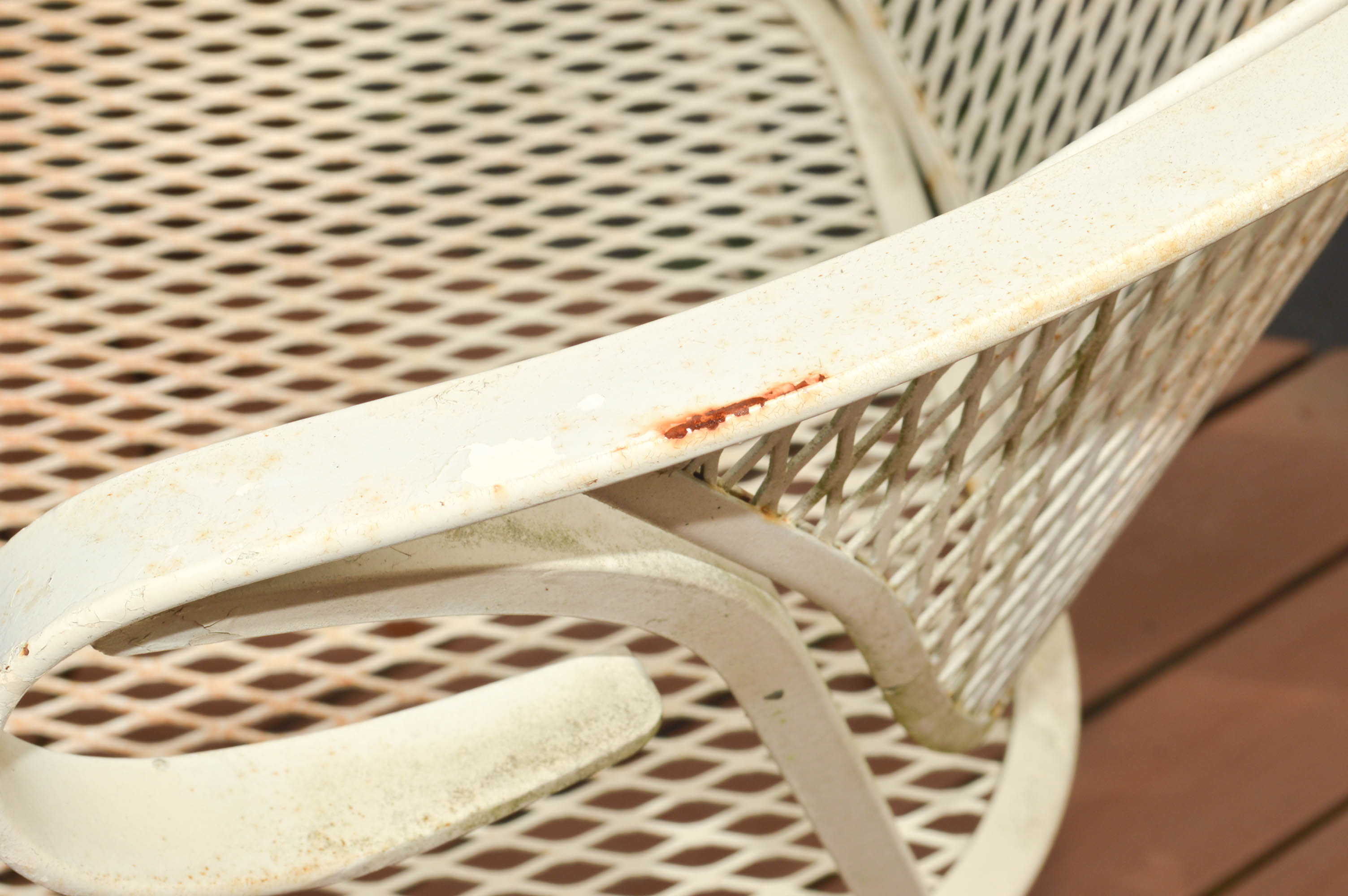 Four Mid-Century Wrought Iron Patio Chairs