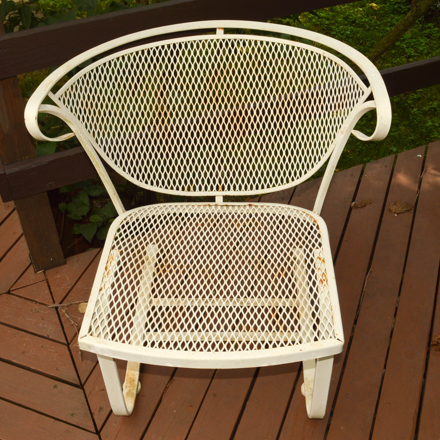 Four Mid-Century Wrought Iron Patio Chairs