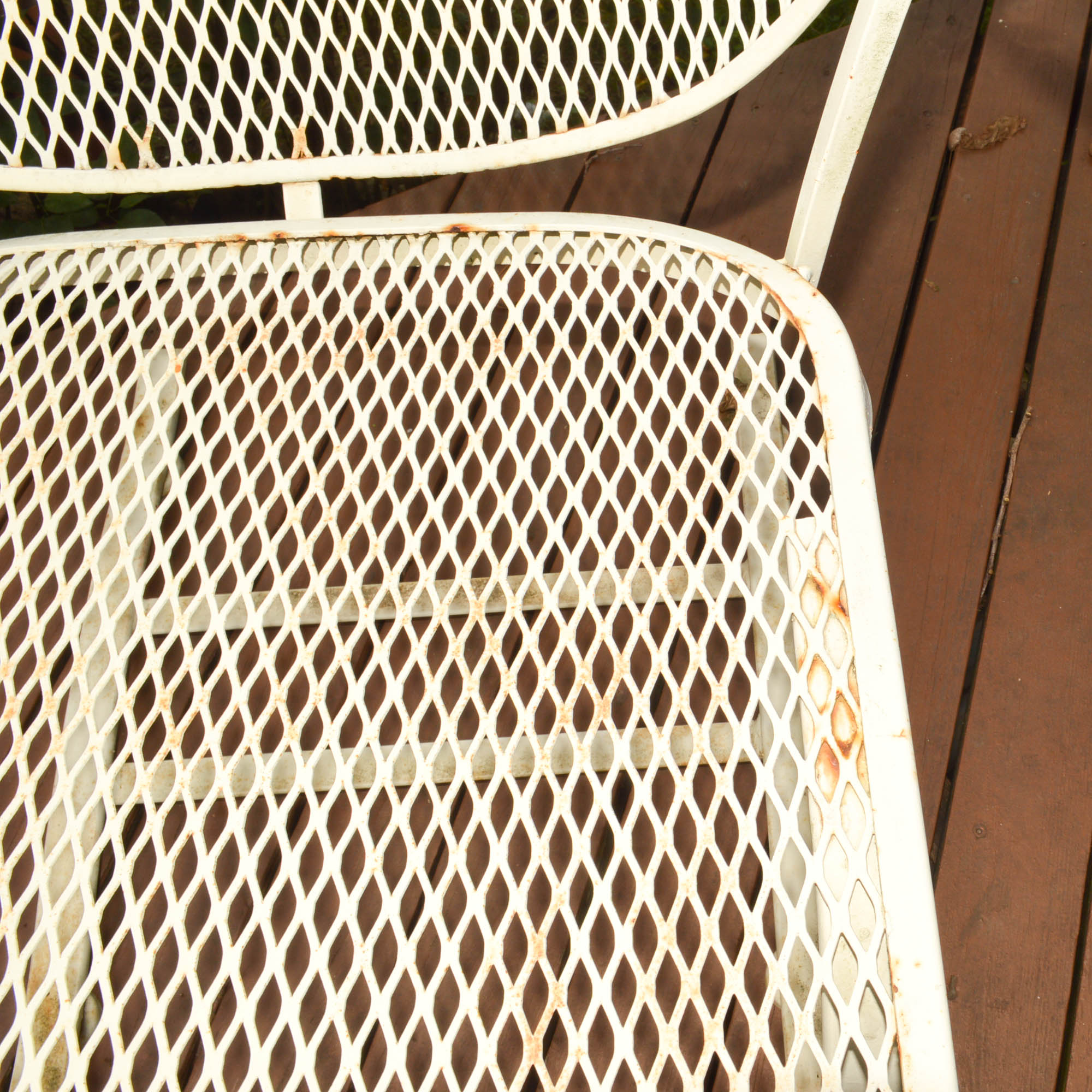 Four Mid-Century Wrought Iron Patio Chairs