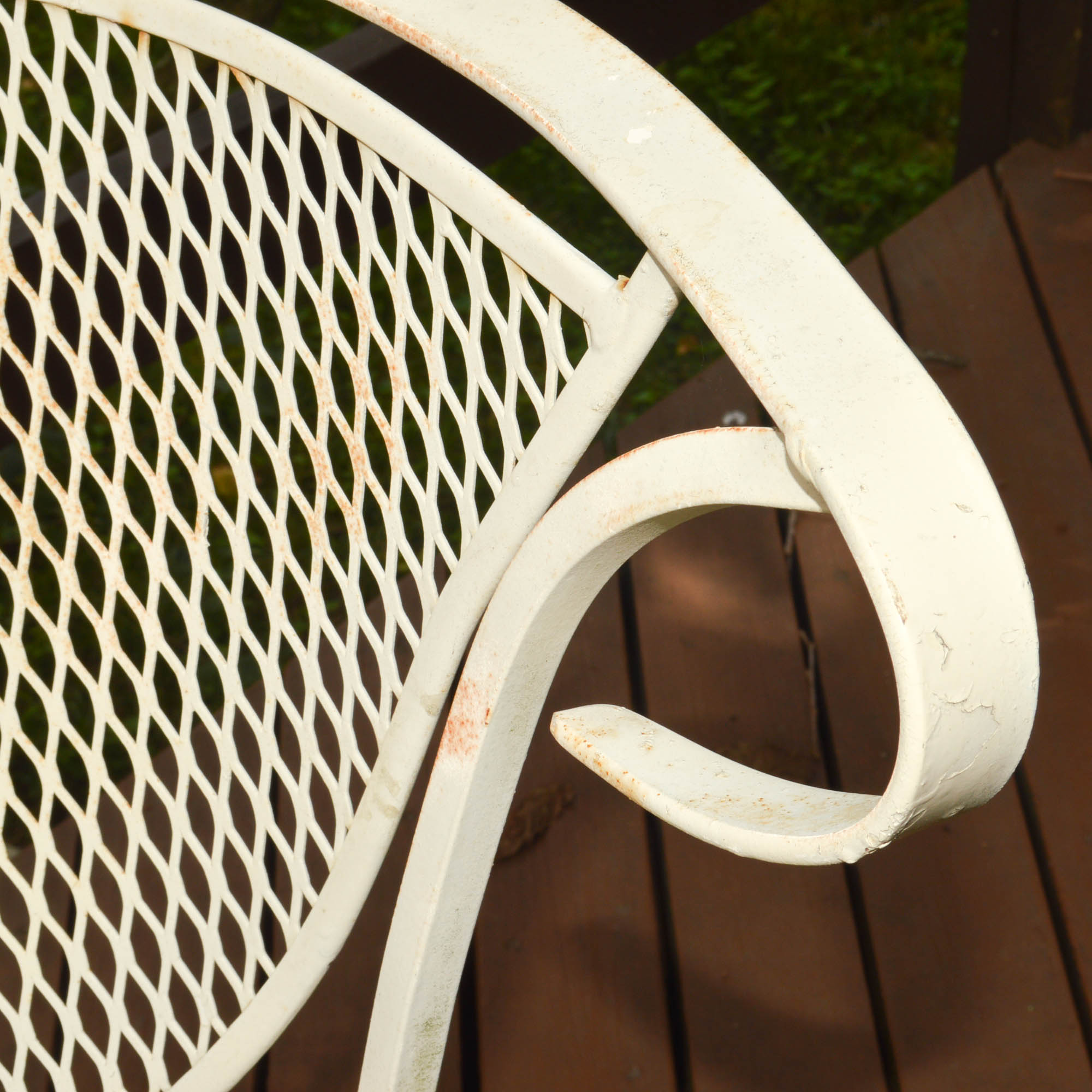 Four Mid-Century Wrought Iron Patio Chairs
