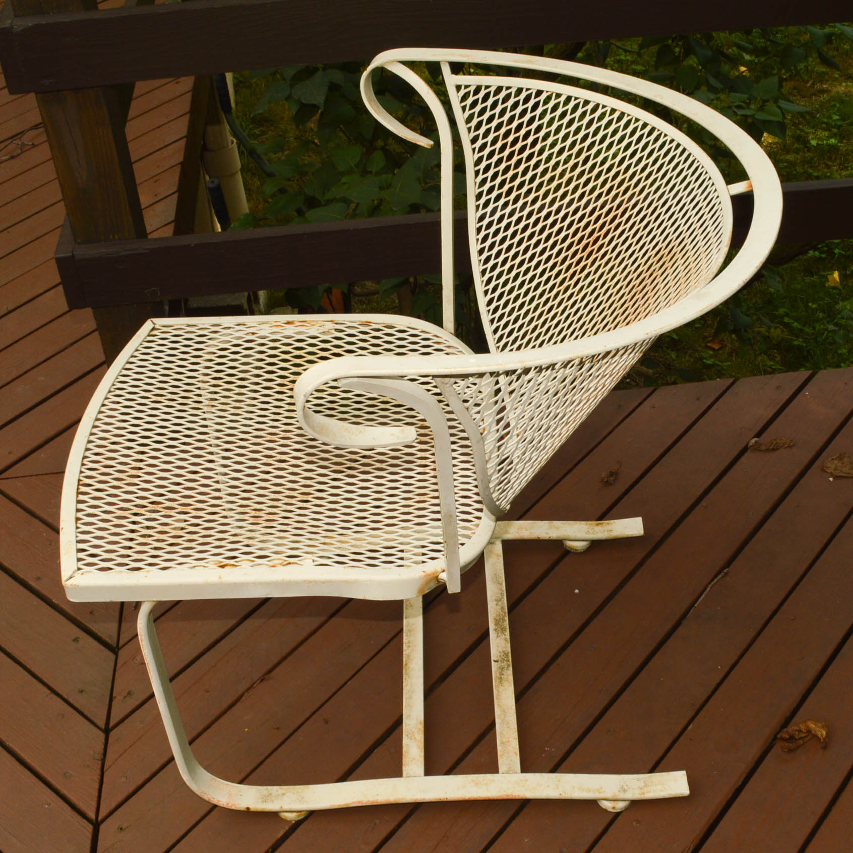 Four Mid-Century Wrought Iron Patio Chairs