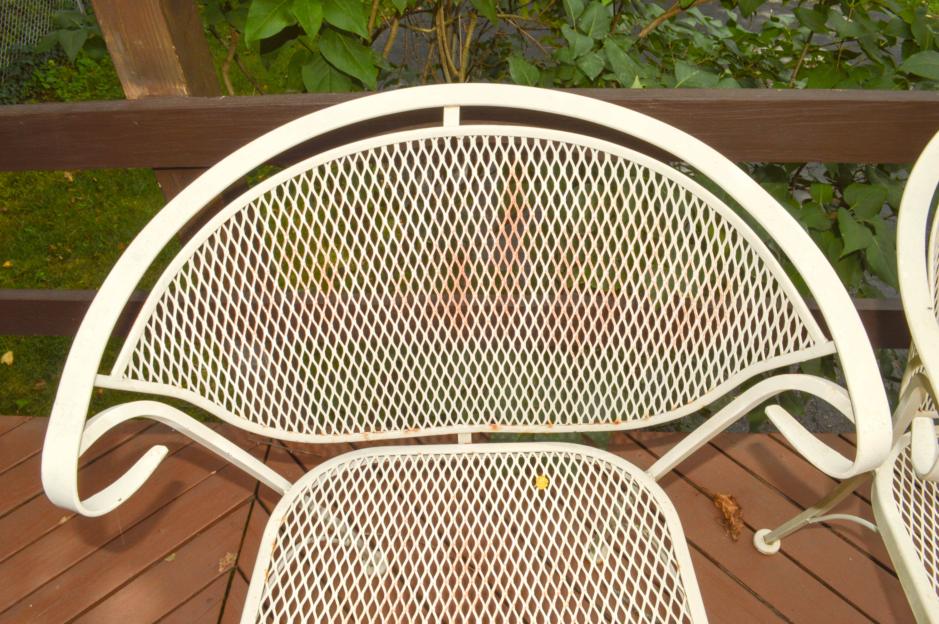 Four Mid-Century Wrought Iron Patio Chairs