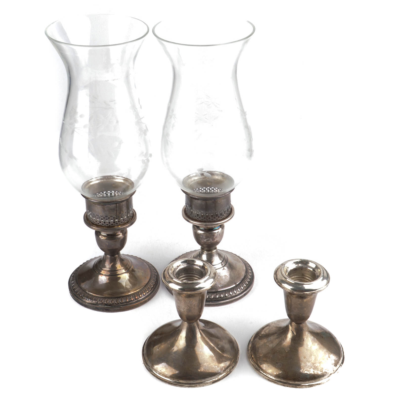 Two Pairs of Weighted Sterling Candleholders Including Hurricanes