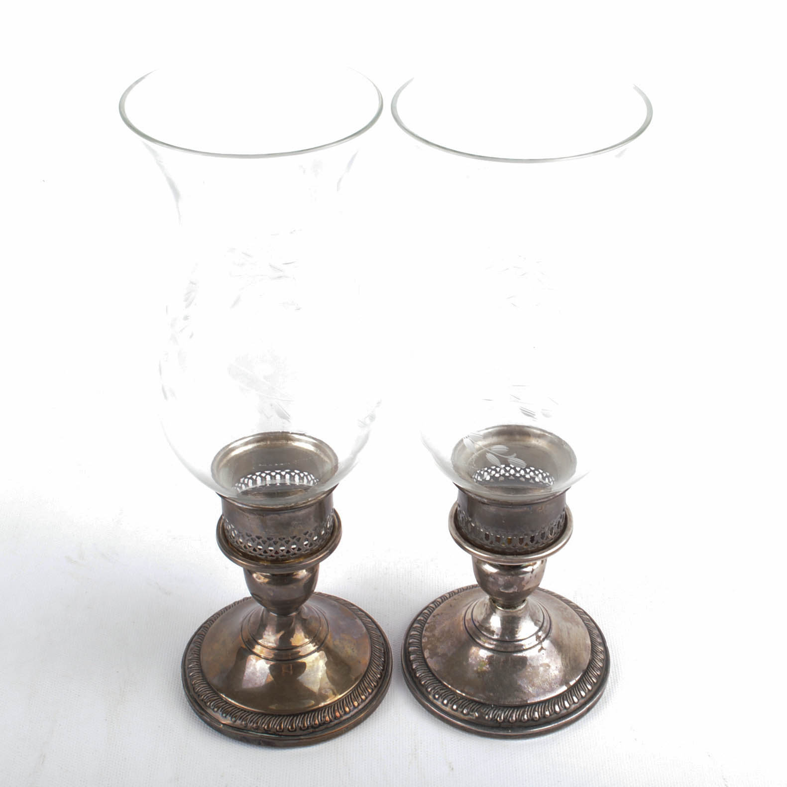 Two Pairs of Weighted Sterling Candleholders Including Hurricanes