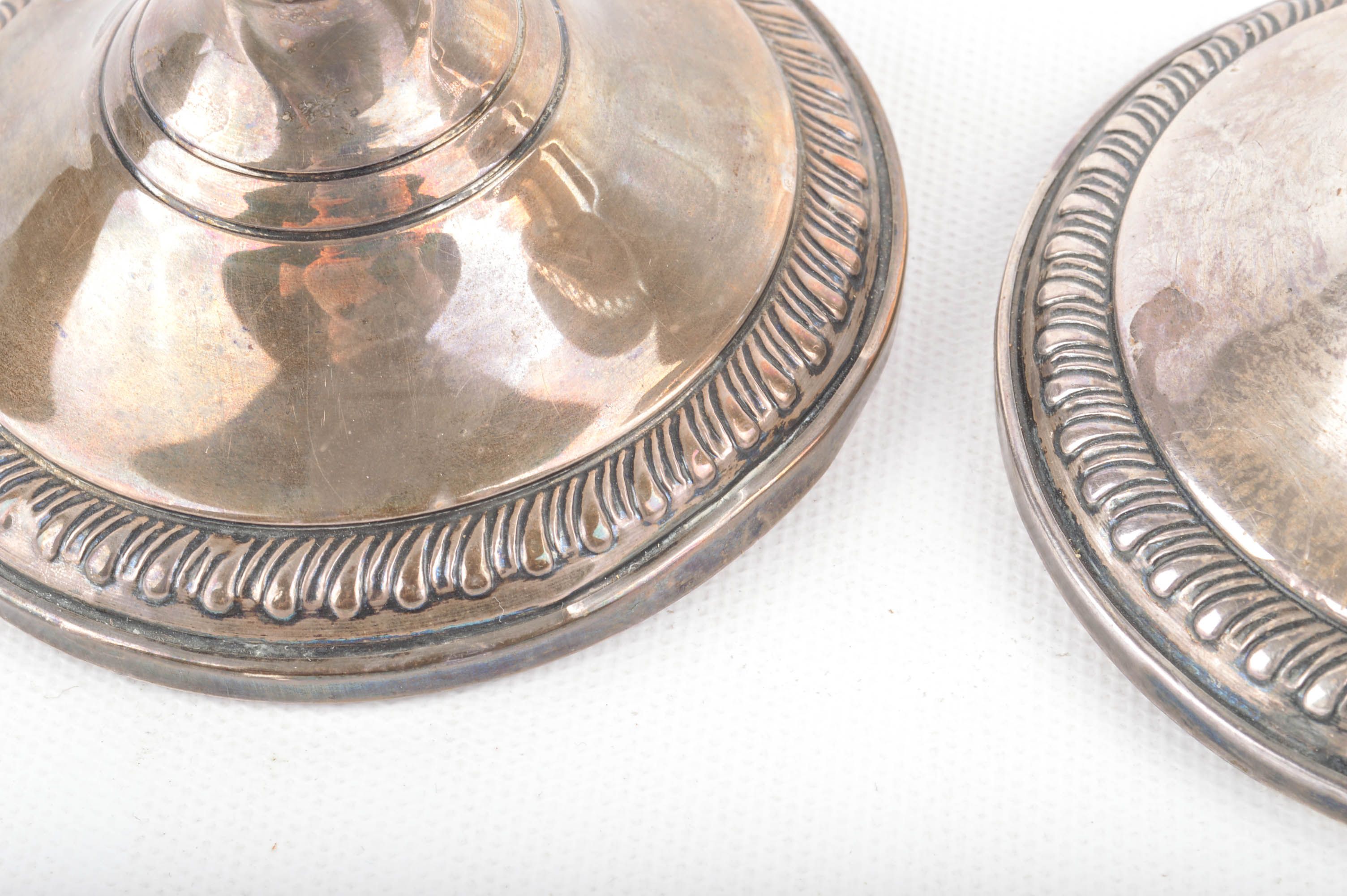 Two Pairs of Weighted Sterling Candleholders Including Hurricanes