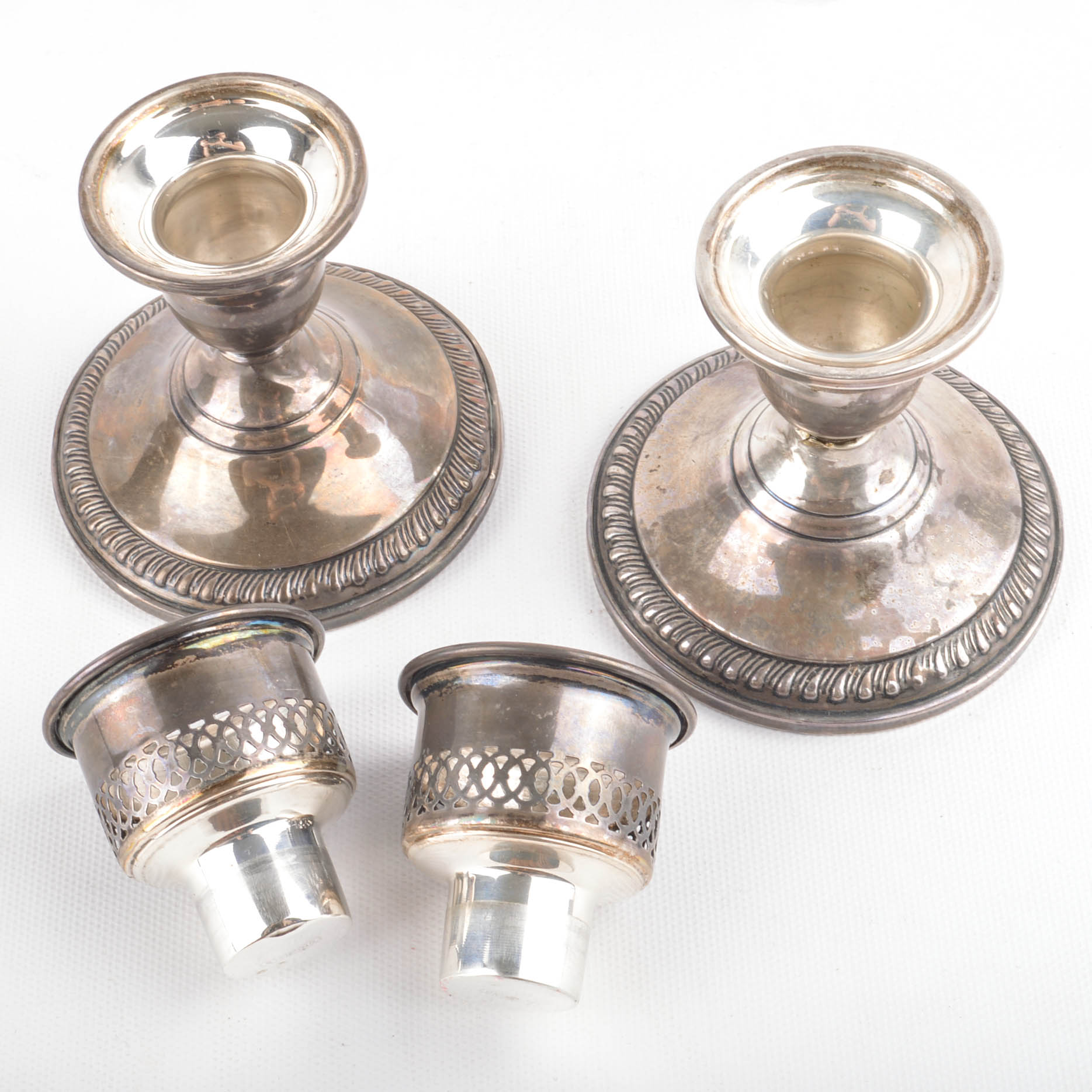 Two Pairs of Weighted Sterling Candleholders Including Hurricanes