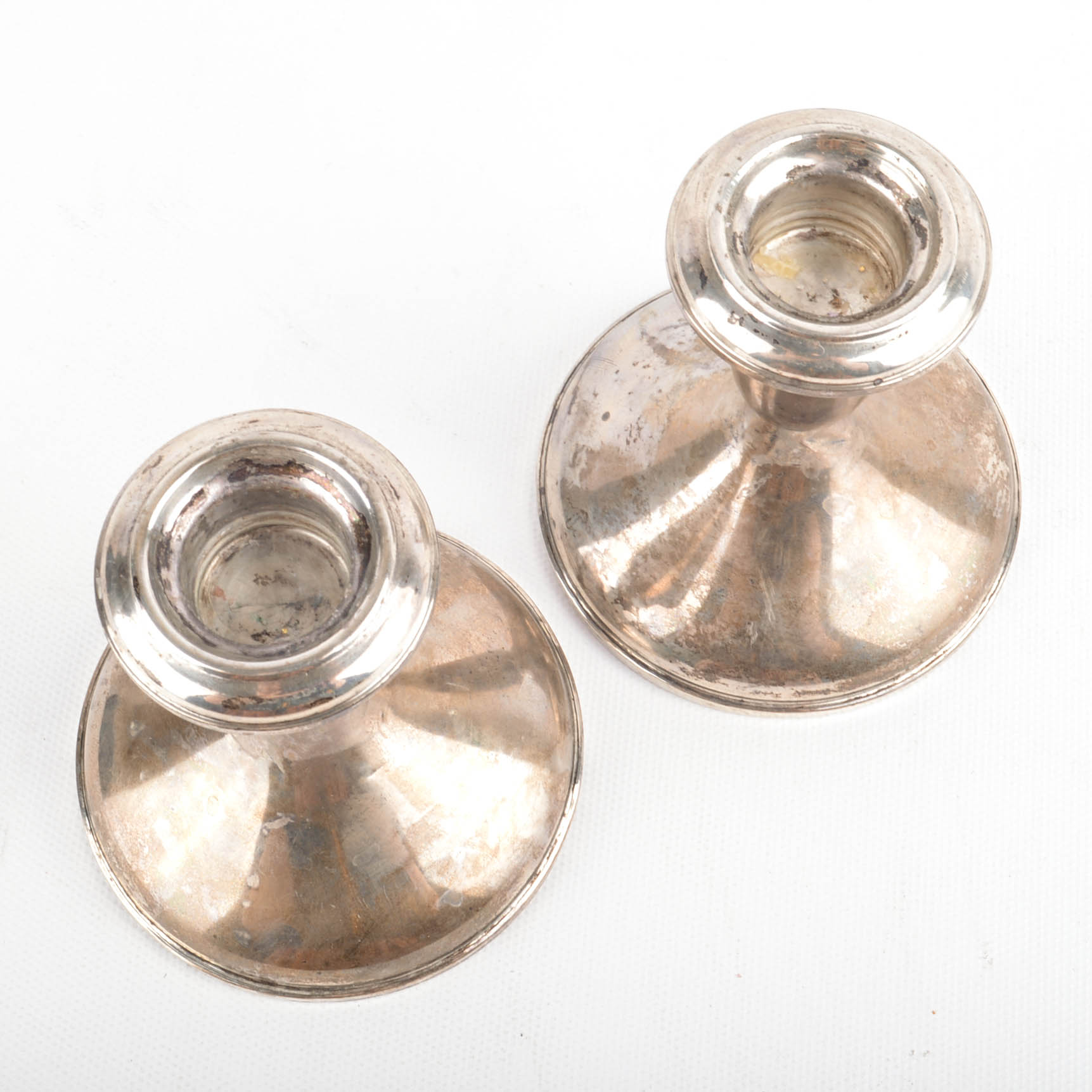 Two Pairs of Weighted Sterling Candleholders Including Hurricanes