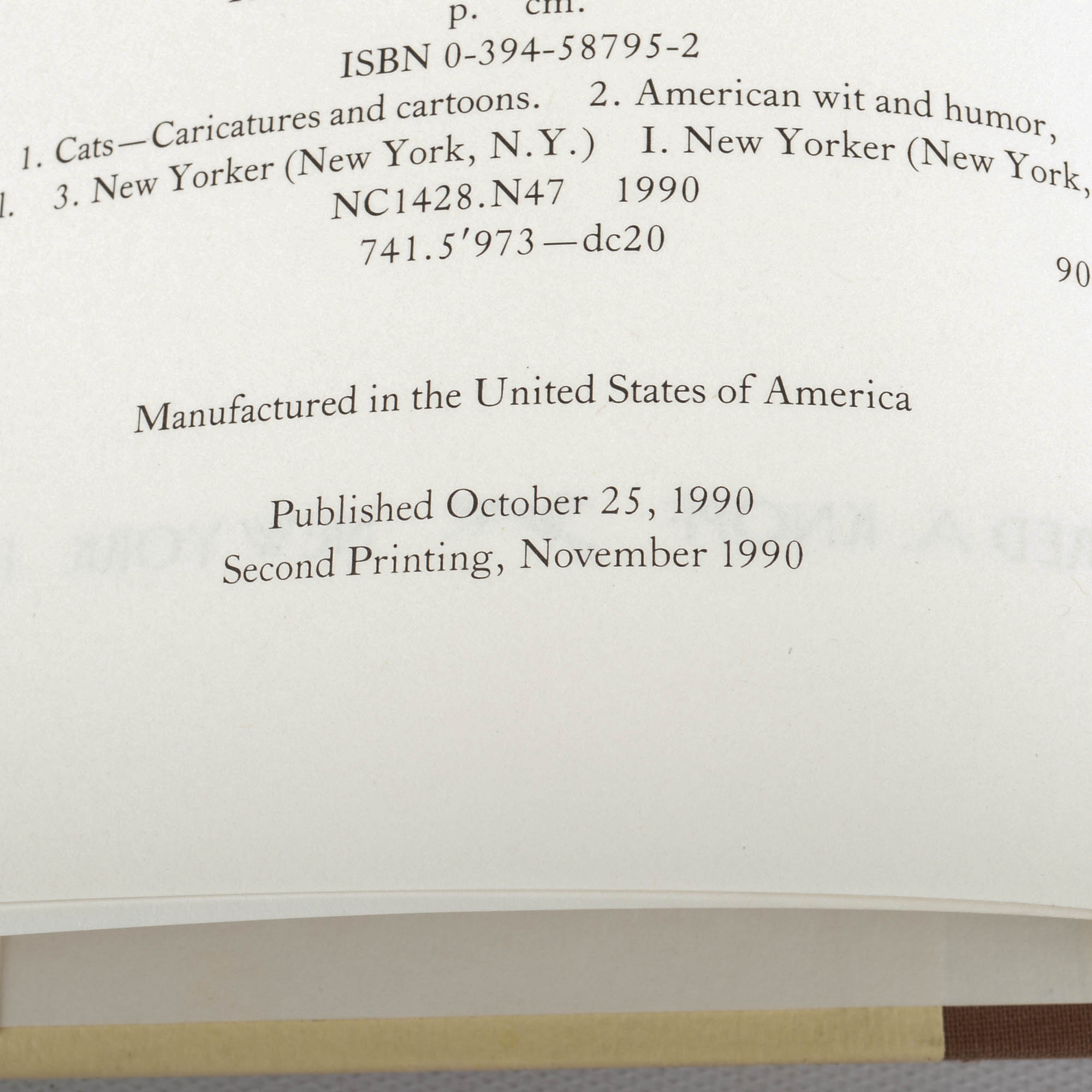 Carved Cat and Mouse Sculptures and Cat-Themed Books