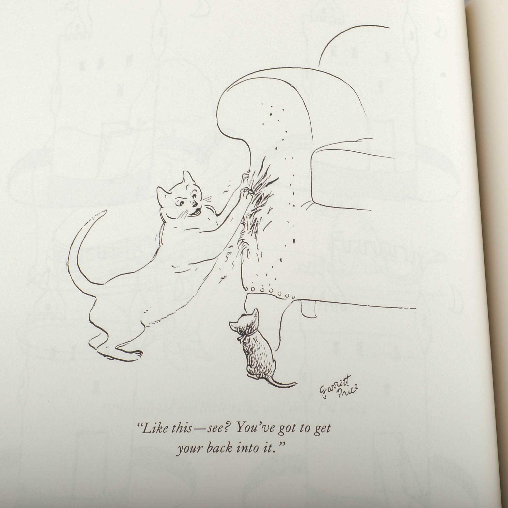 Carved Cat and Mouse Sculptures and Cat-Themed Books