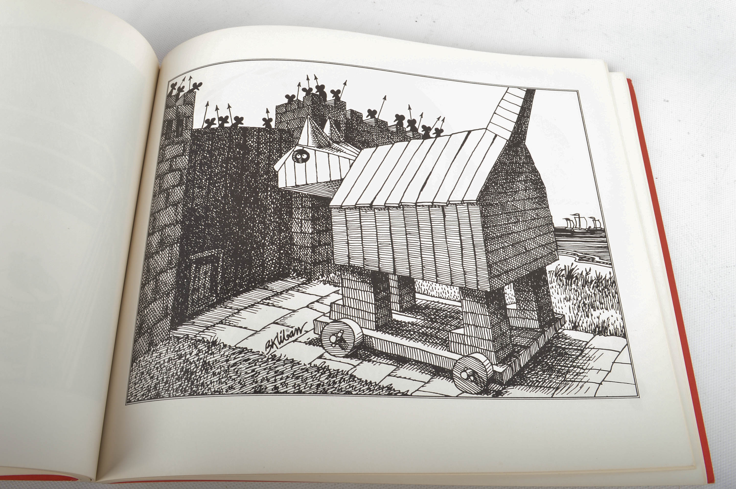 Carved Cat and Mouse Sculptures and Cat-Themed Books