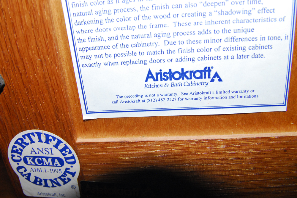 Aristokraft Bathroom Cabinet Including Moet Faucet