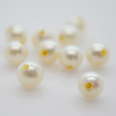 Ten Loose Cultured Pearls
