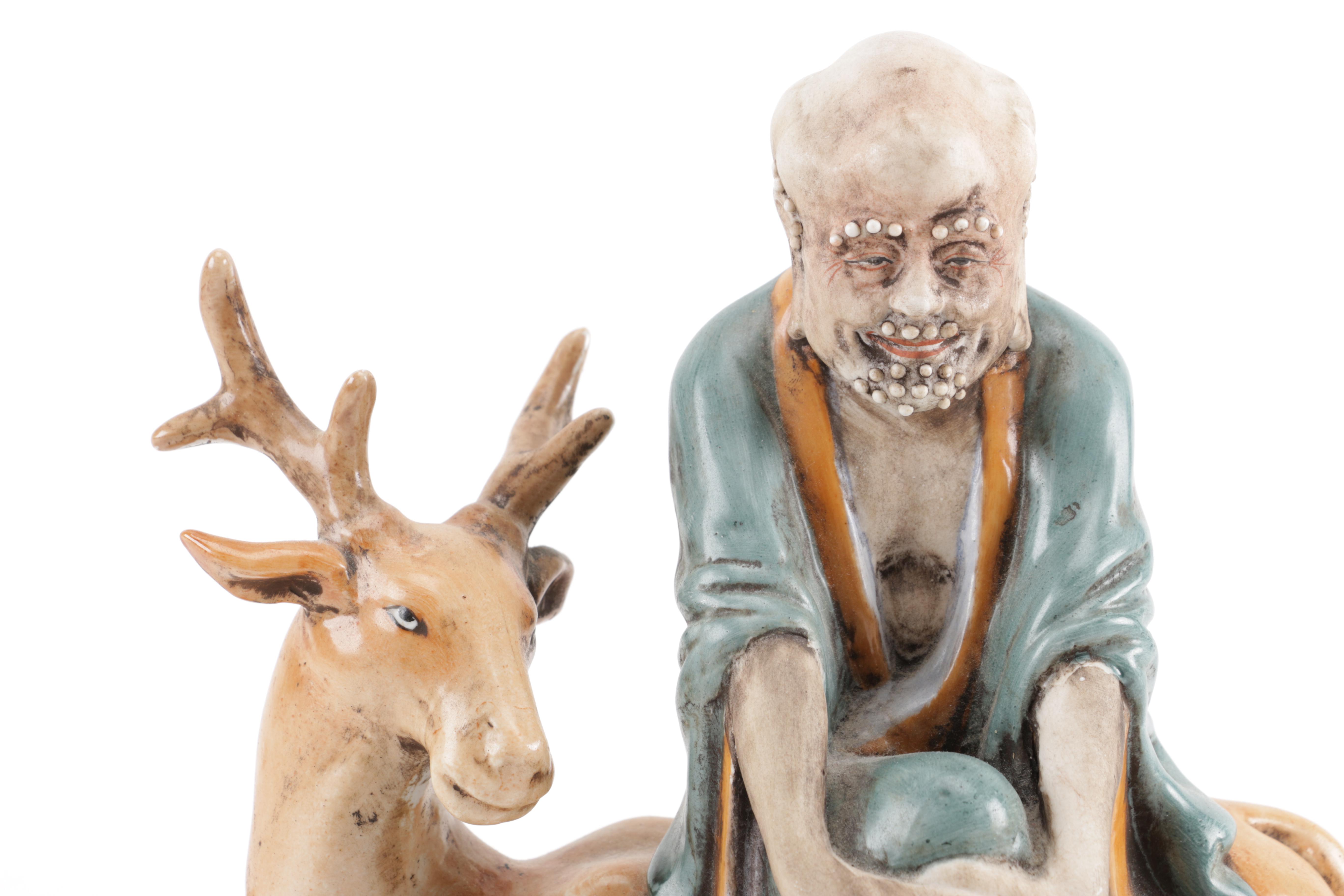 H.F.P. Macau Figurine of Man and Deer