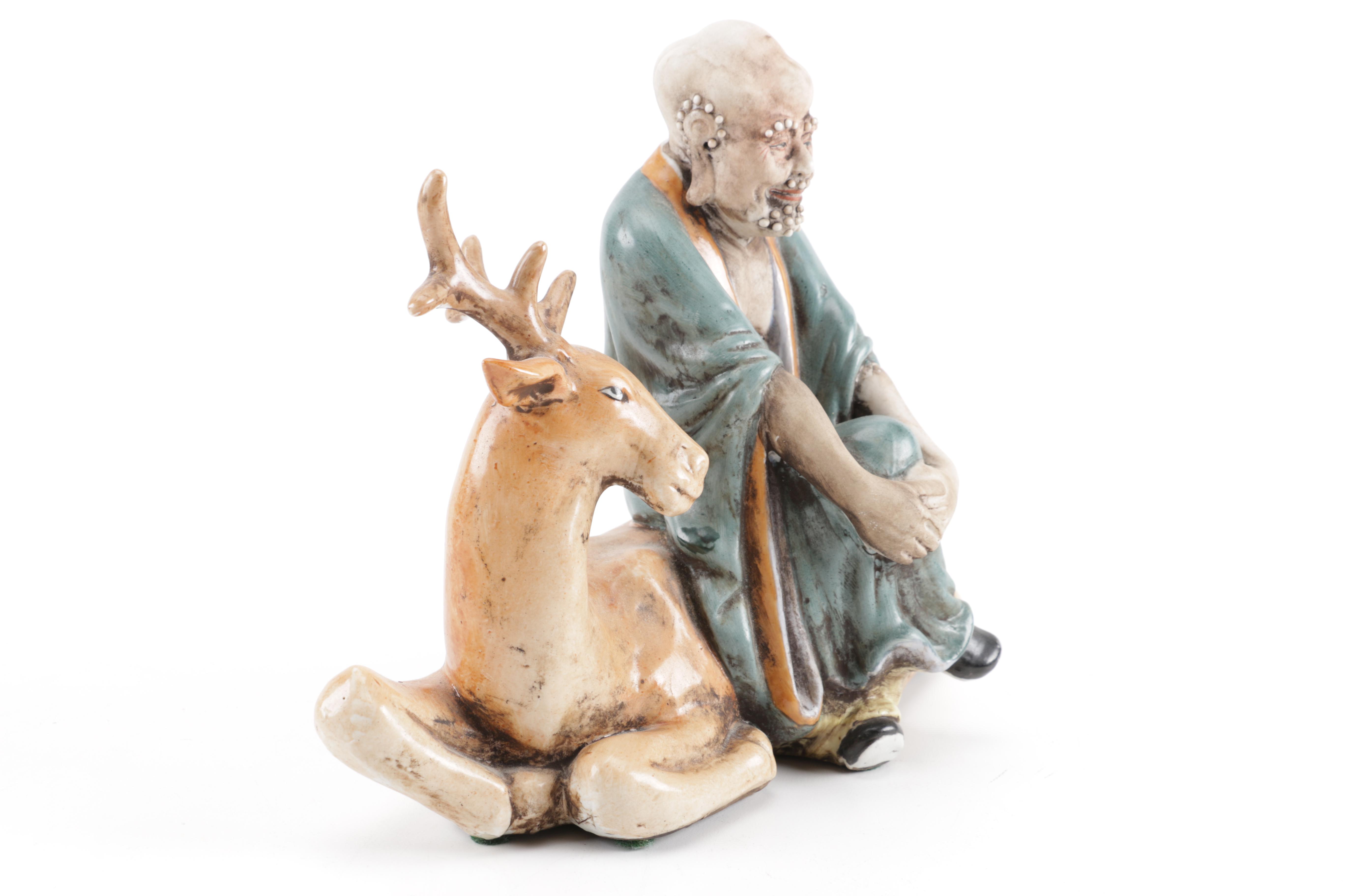 H.F.P. Macau Figurine of Man and Deer
