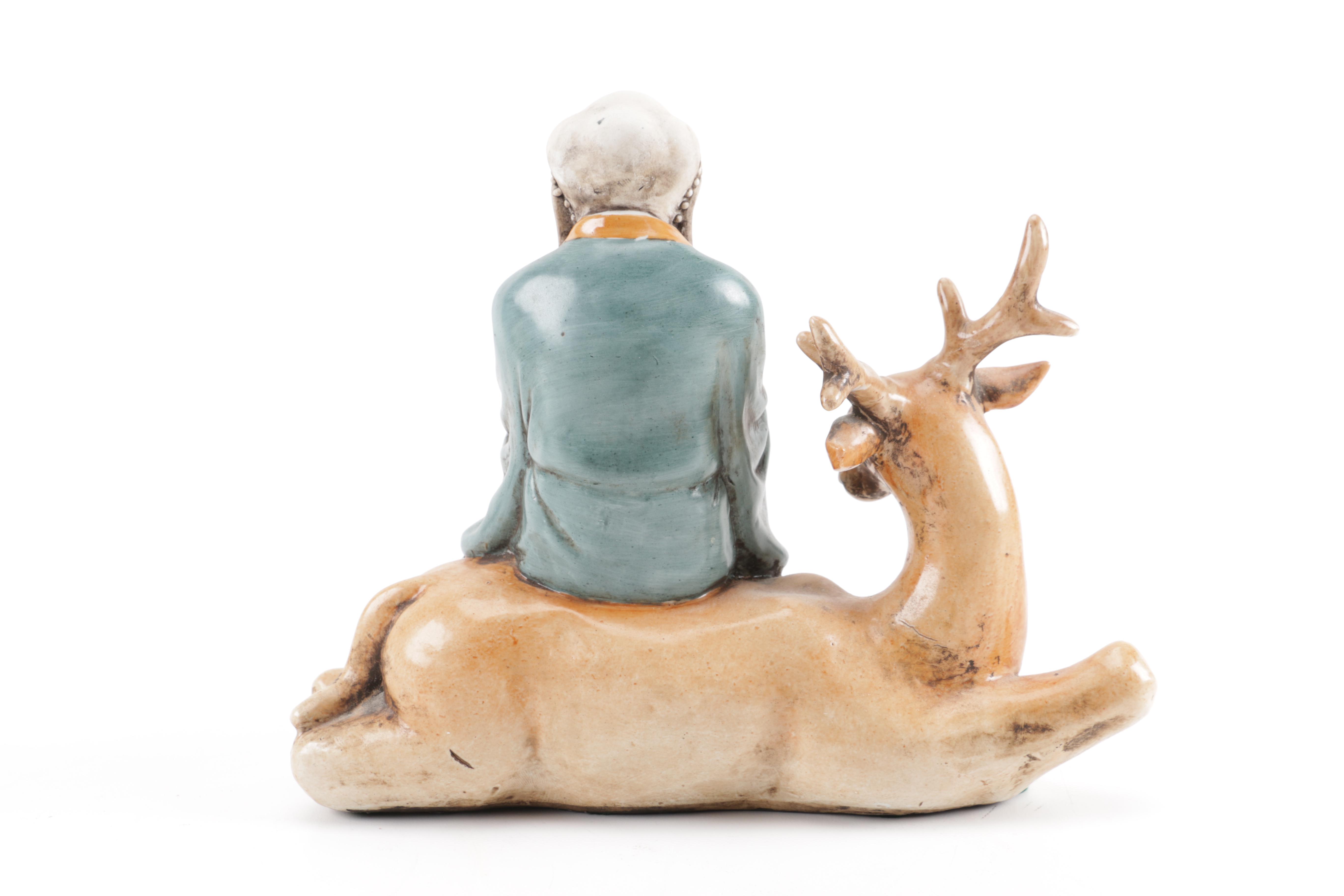 H.F.P. Macau Figurine of Man and Deer
