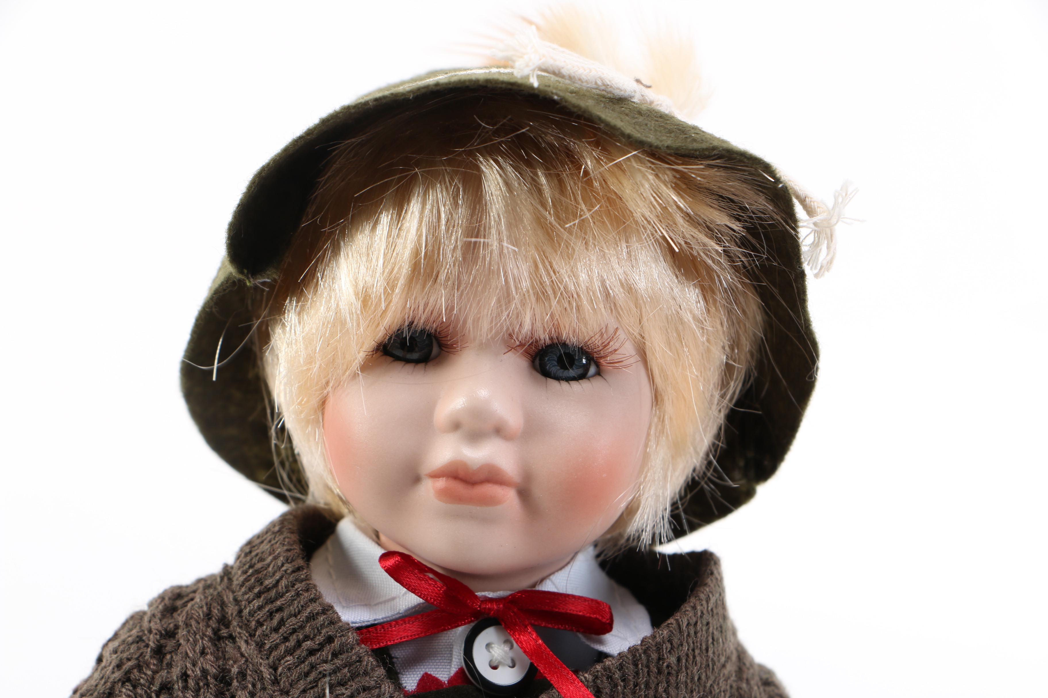 Collection of German Themed Porcelain Dolls