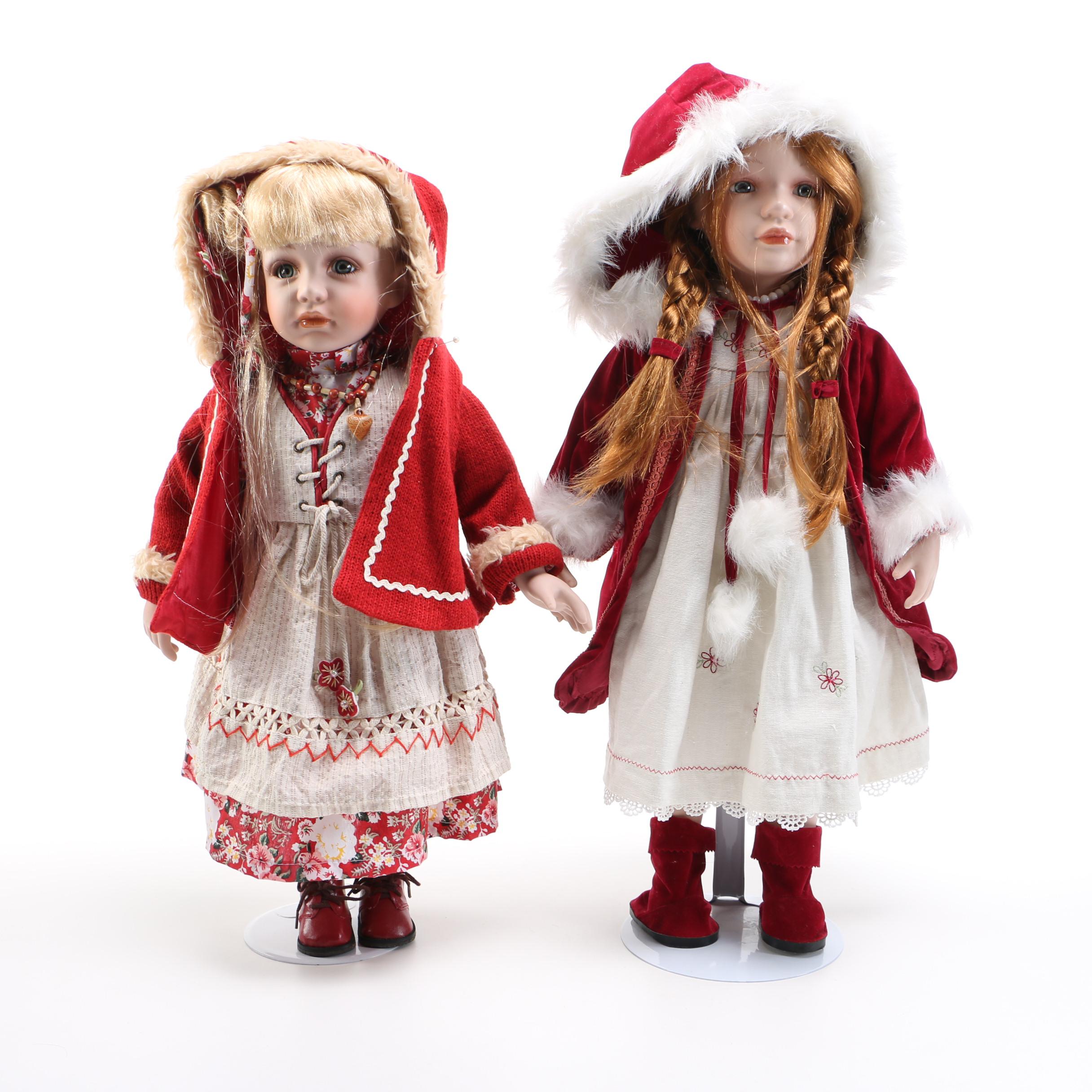 Pair of Porcelain Dolls in Seasonal Outfits