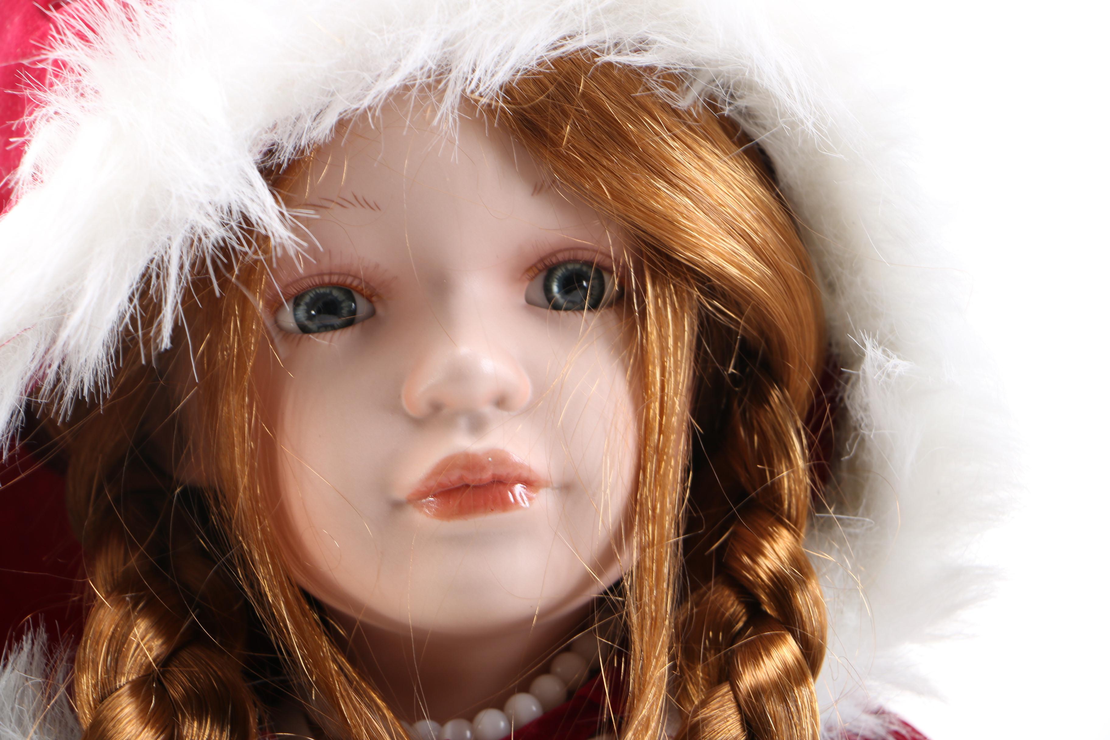 Pair of Porcelain Dolls in Seasonal Outfits