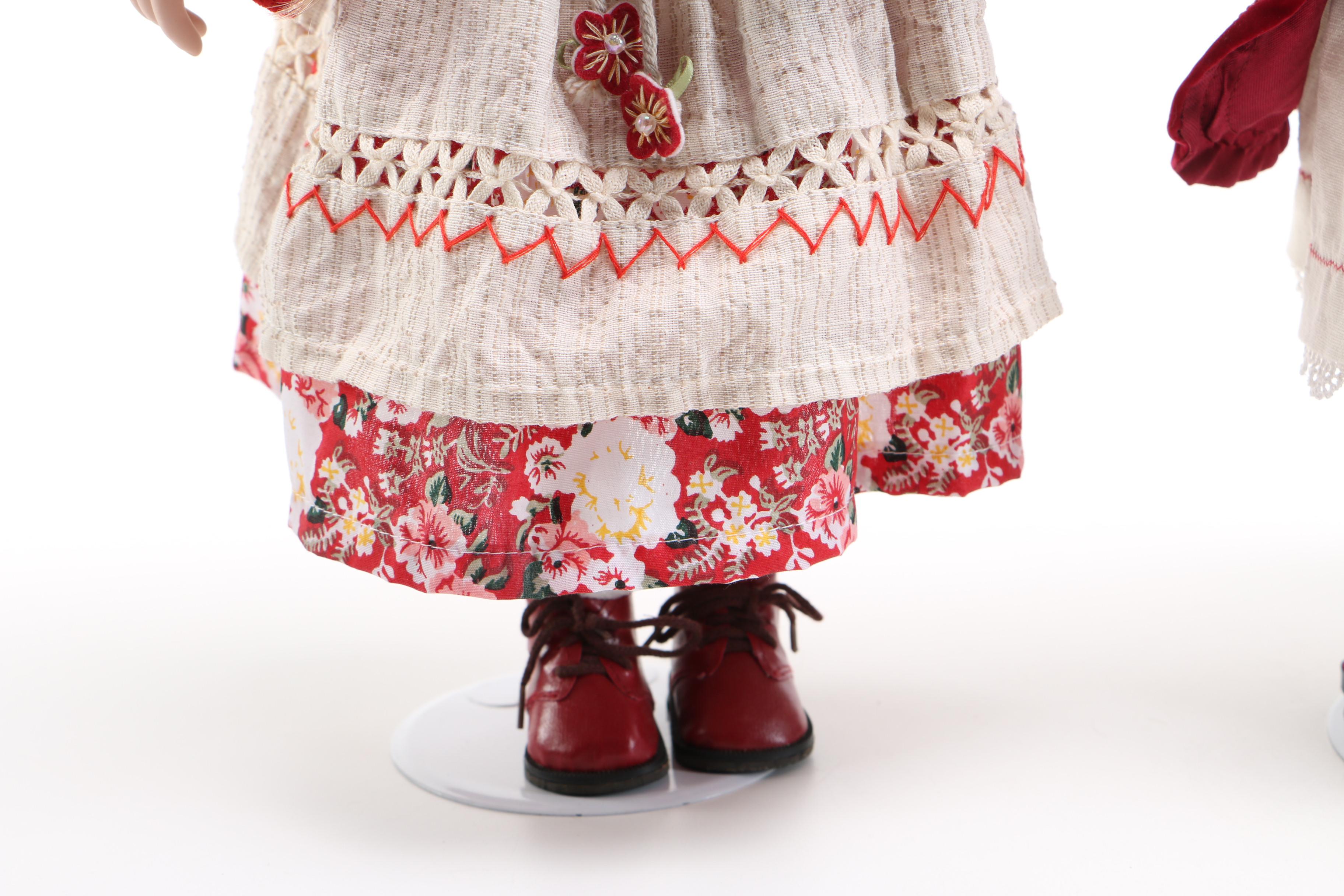 Pair of Porcelain Dolls in Seasonal Outfits