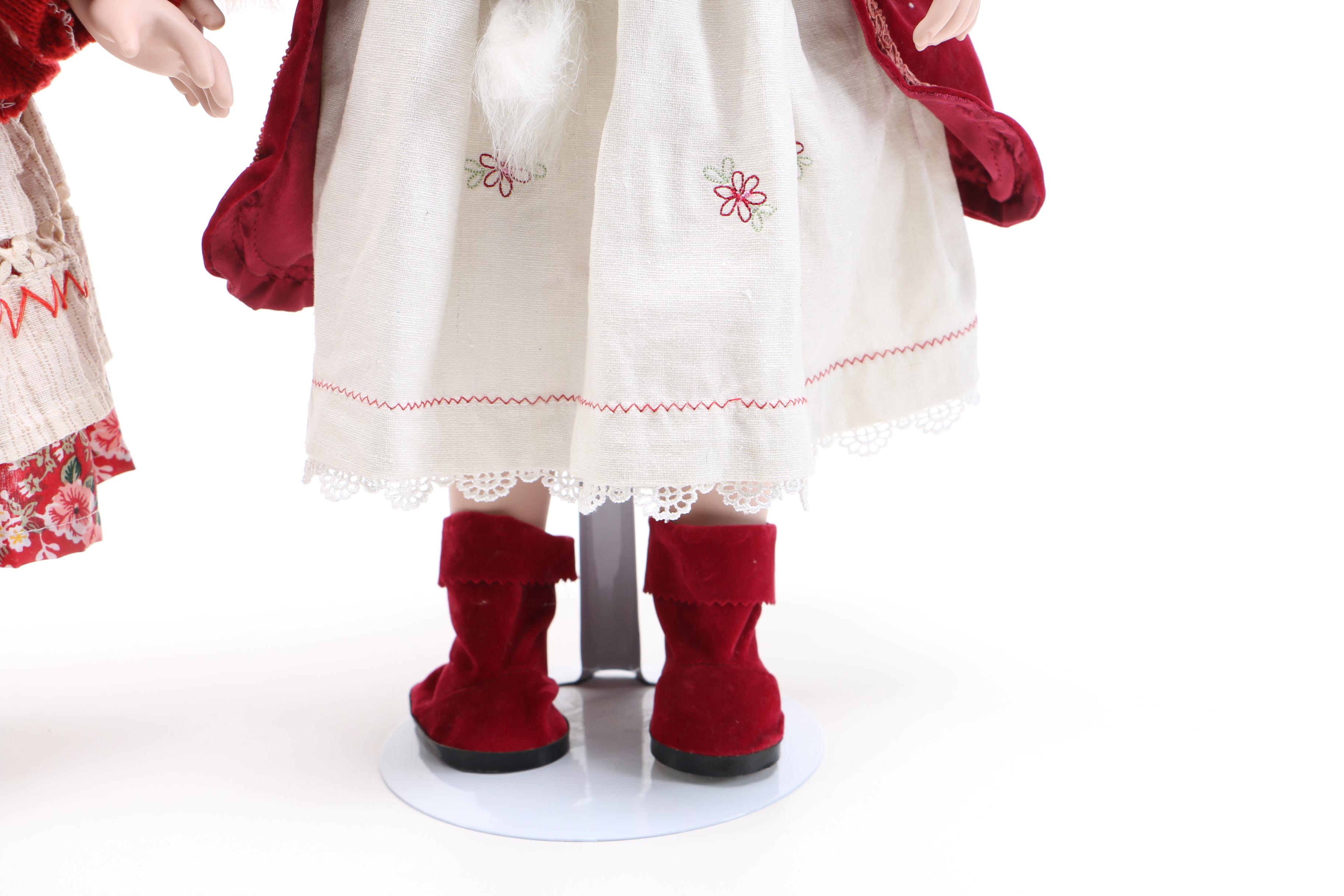 Pair of Porcelain Dolls in Seasonal Outfits