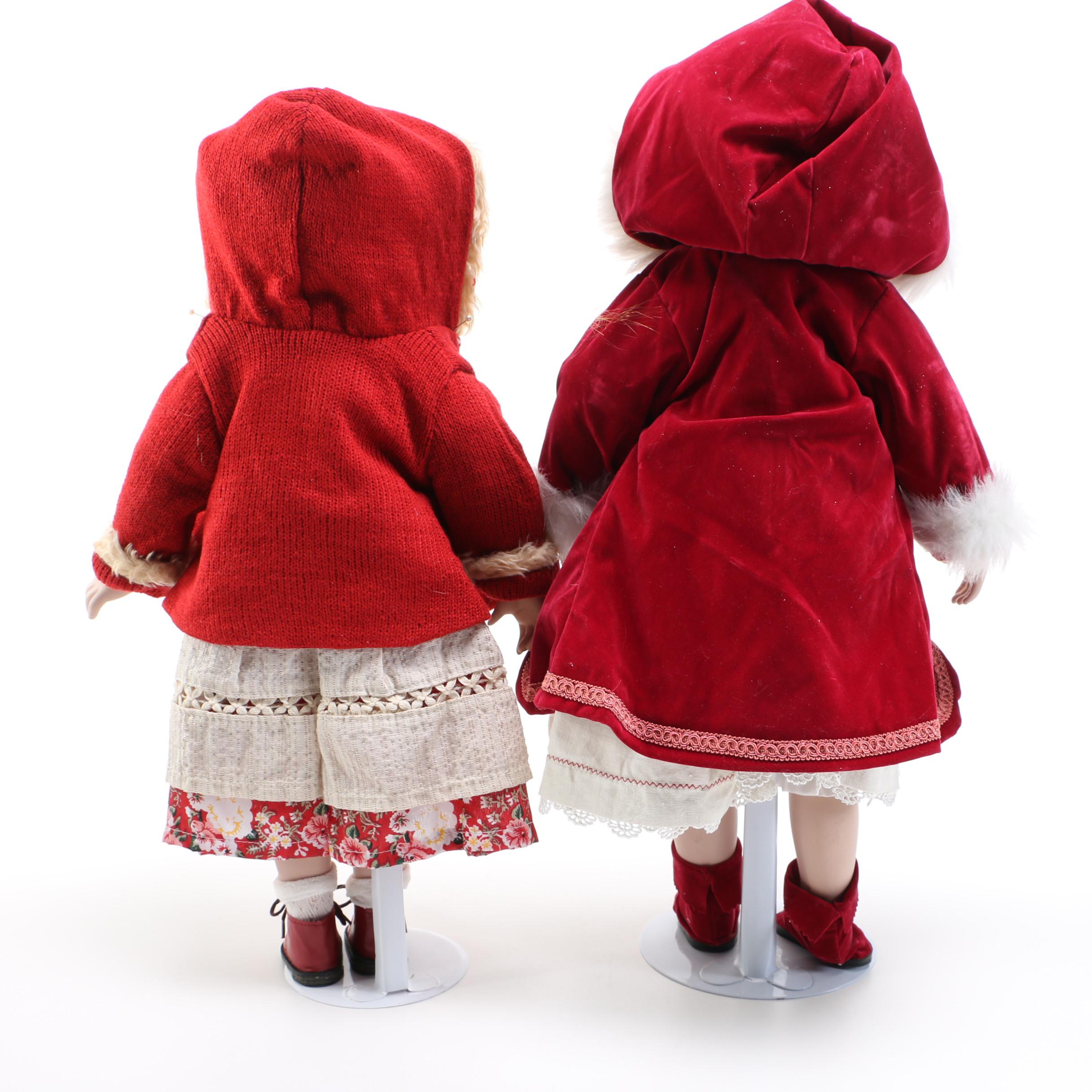 Pair of Porcelain Dolls in Seasonal Outfits