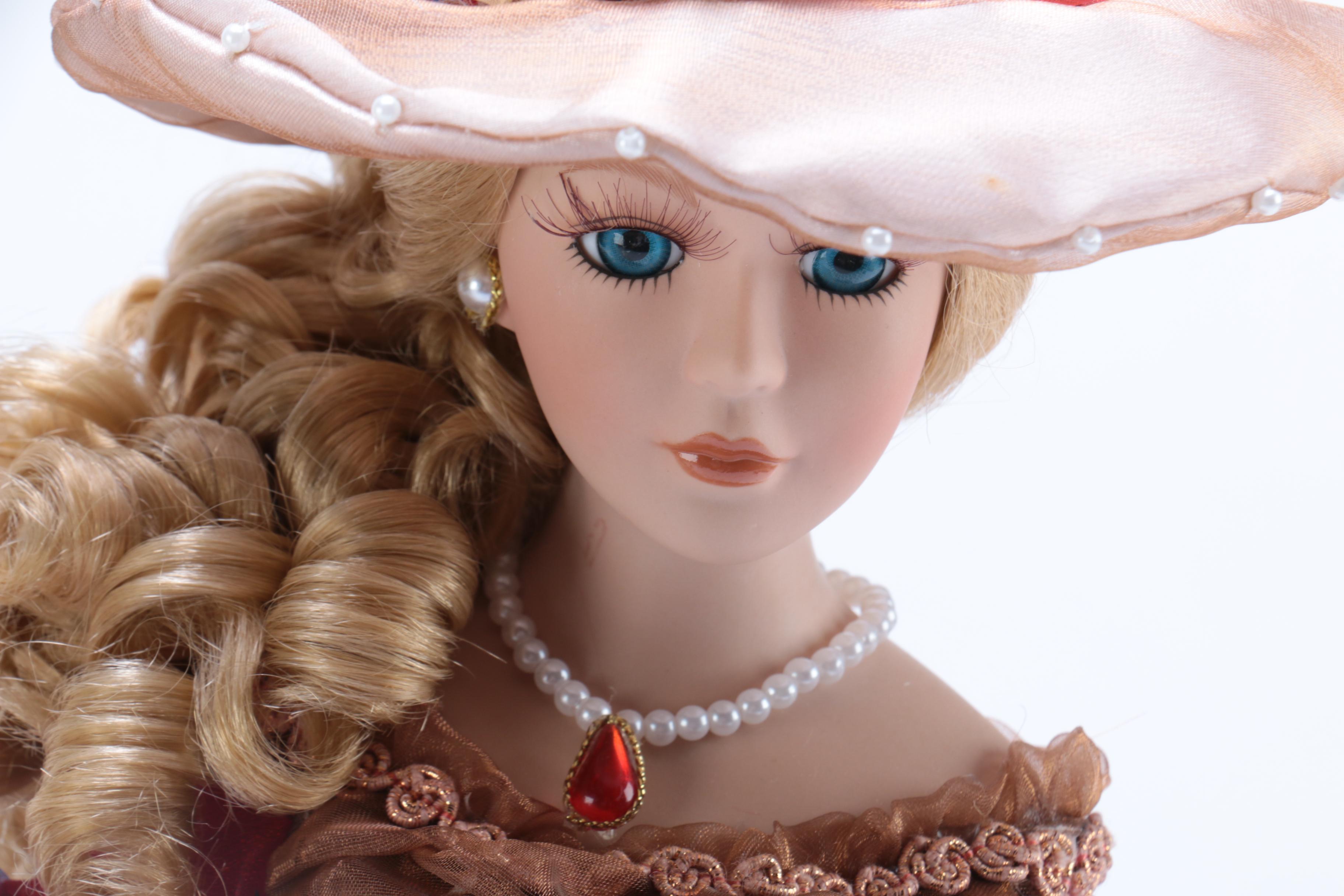 Pair of Victorian Style Porcelain Dolls