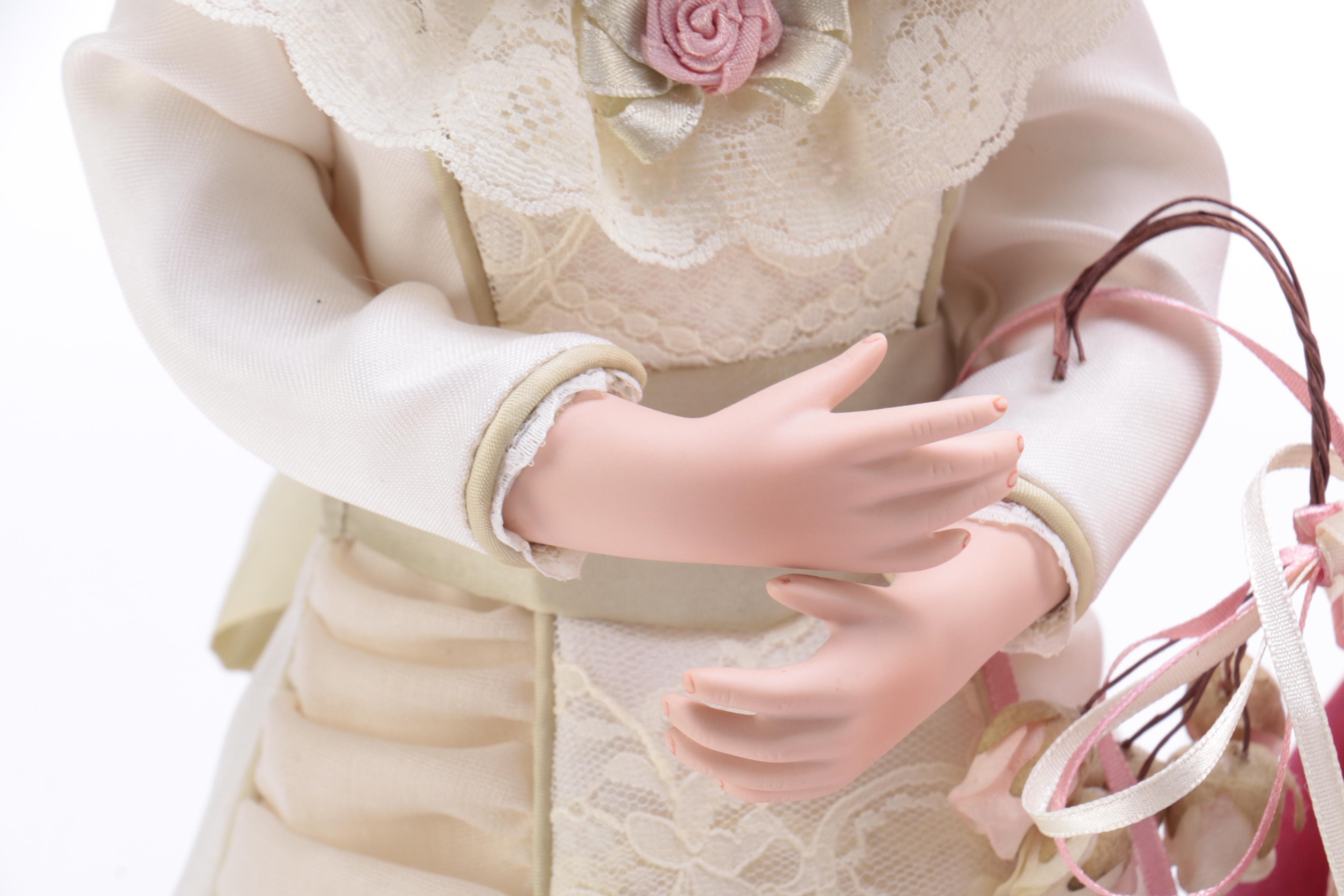 Pair of Victorian Style Porcelain Dolls