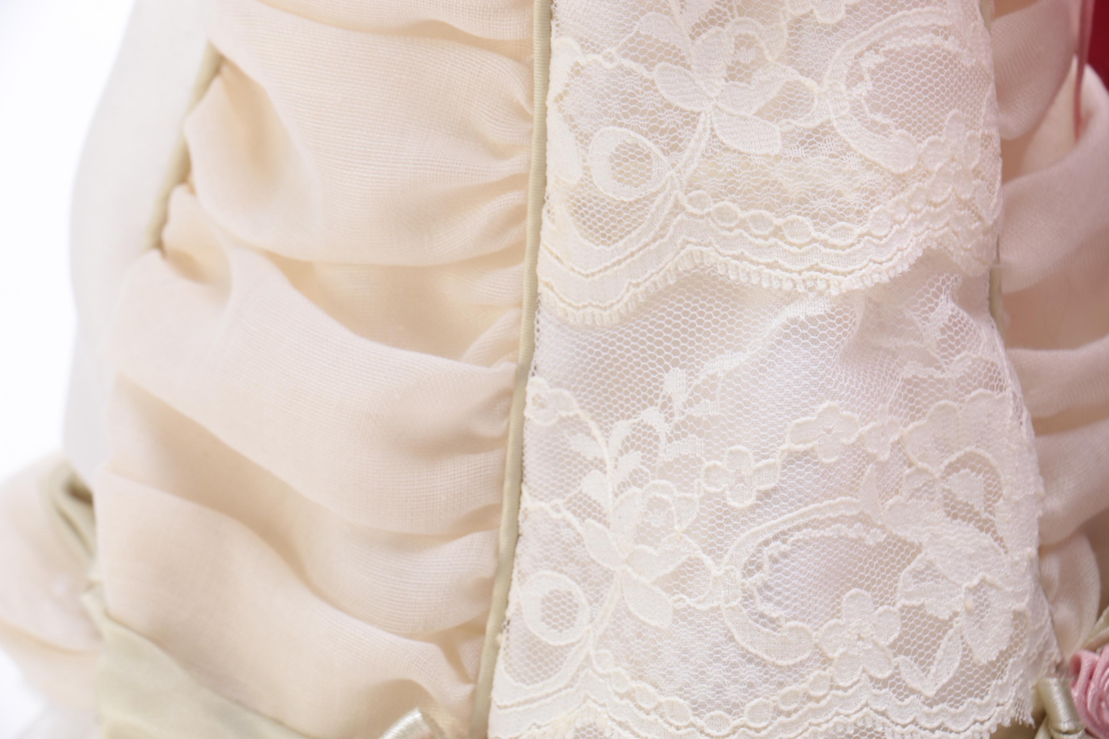 Pair of Victorian Style Porcelain Dolls