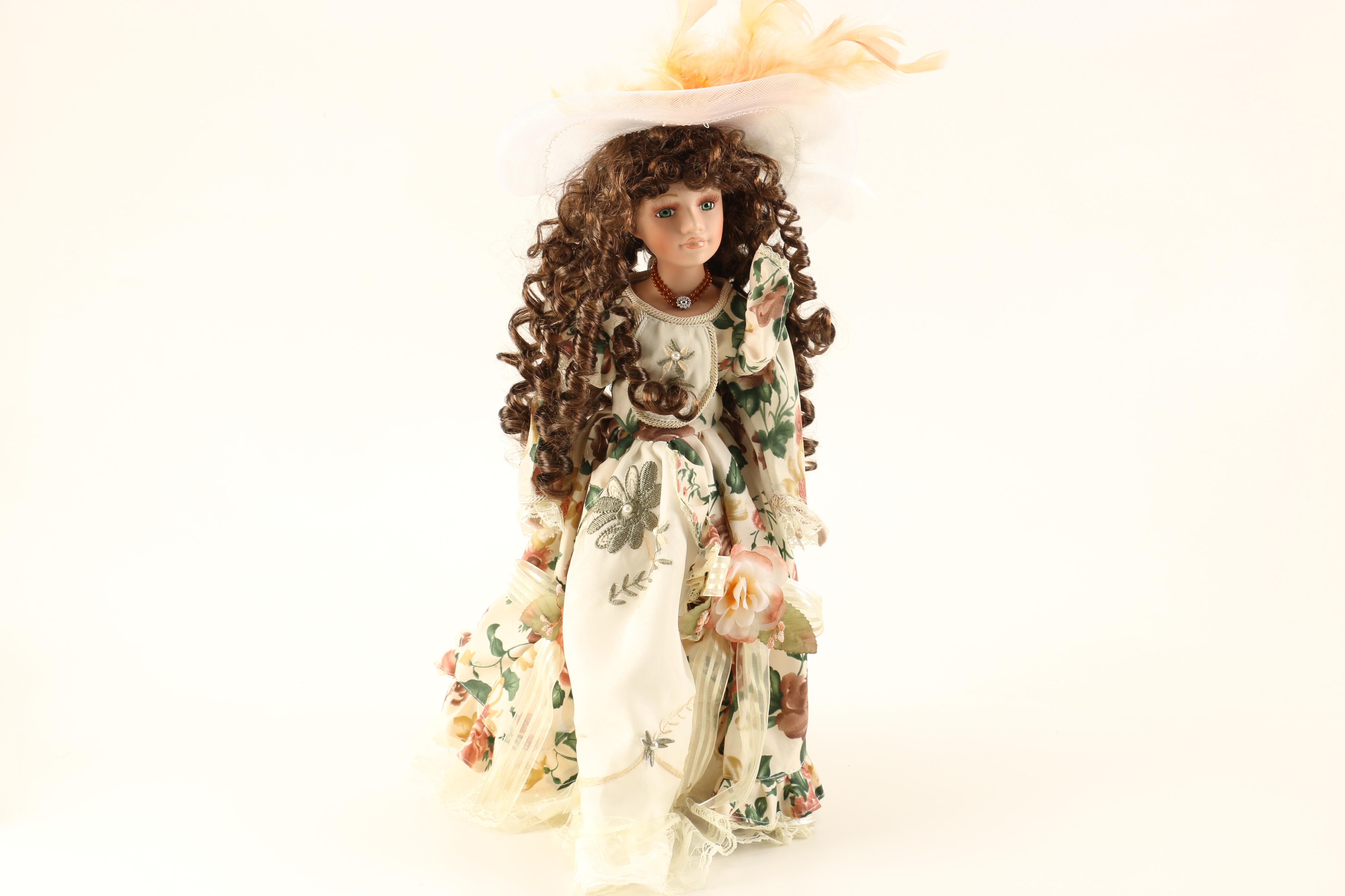 Collection of Three Porcelain Dolls