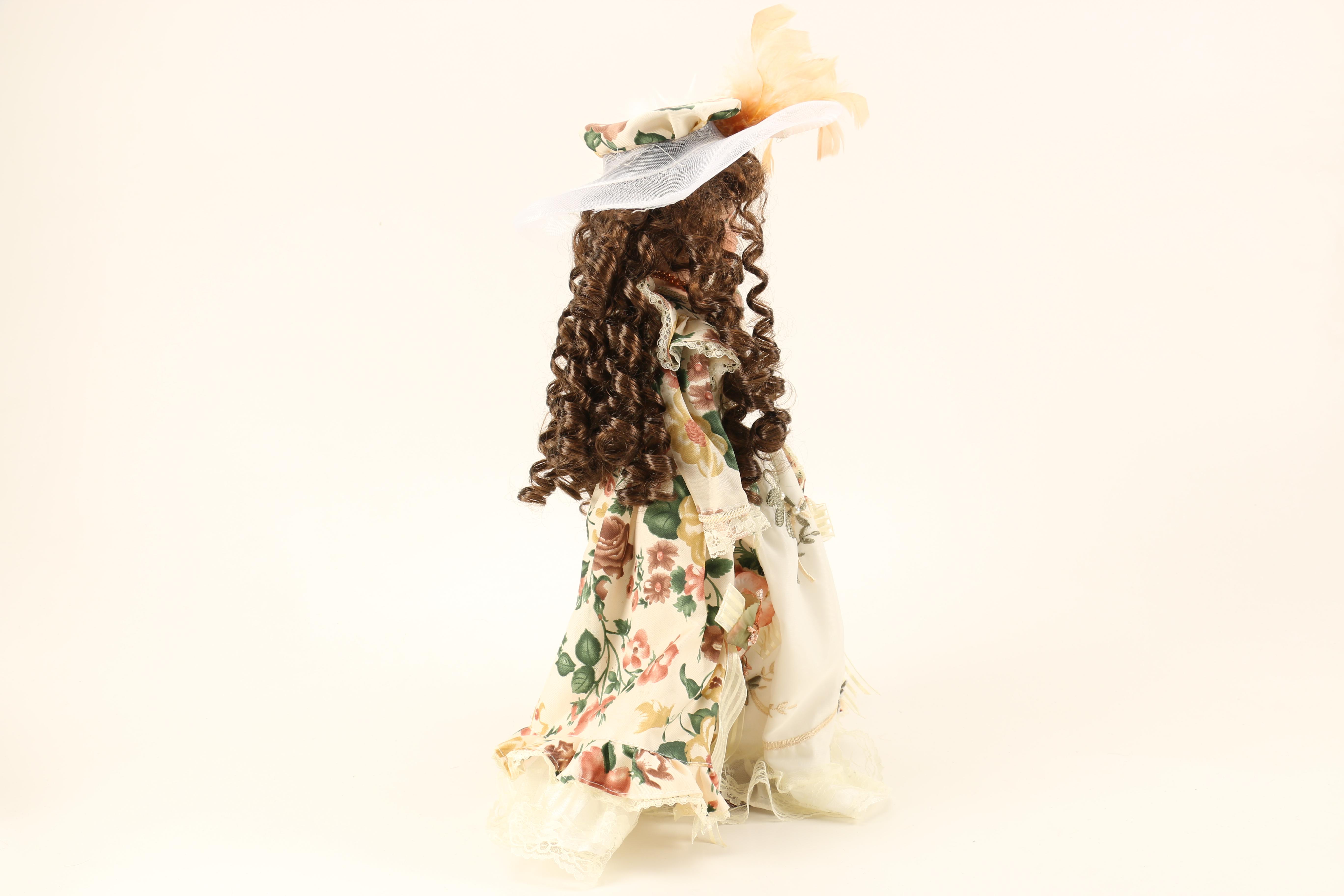 Collection of Three Porcelain Dolls