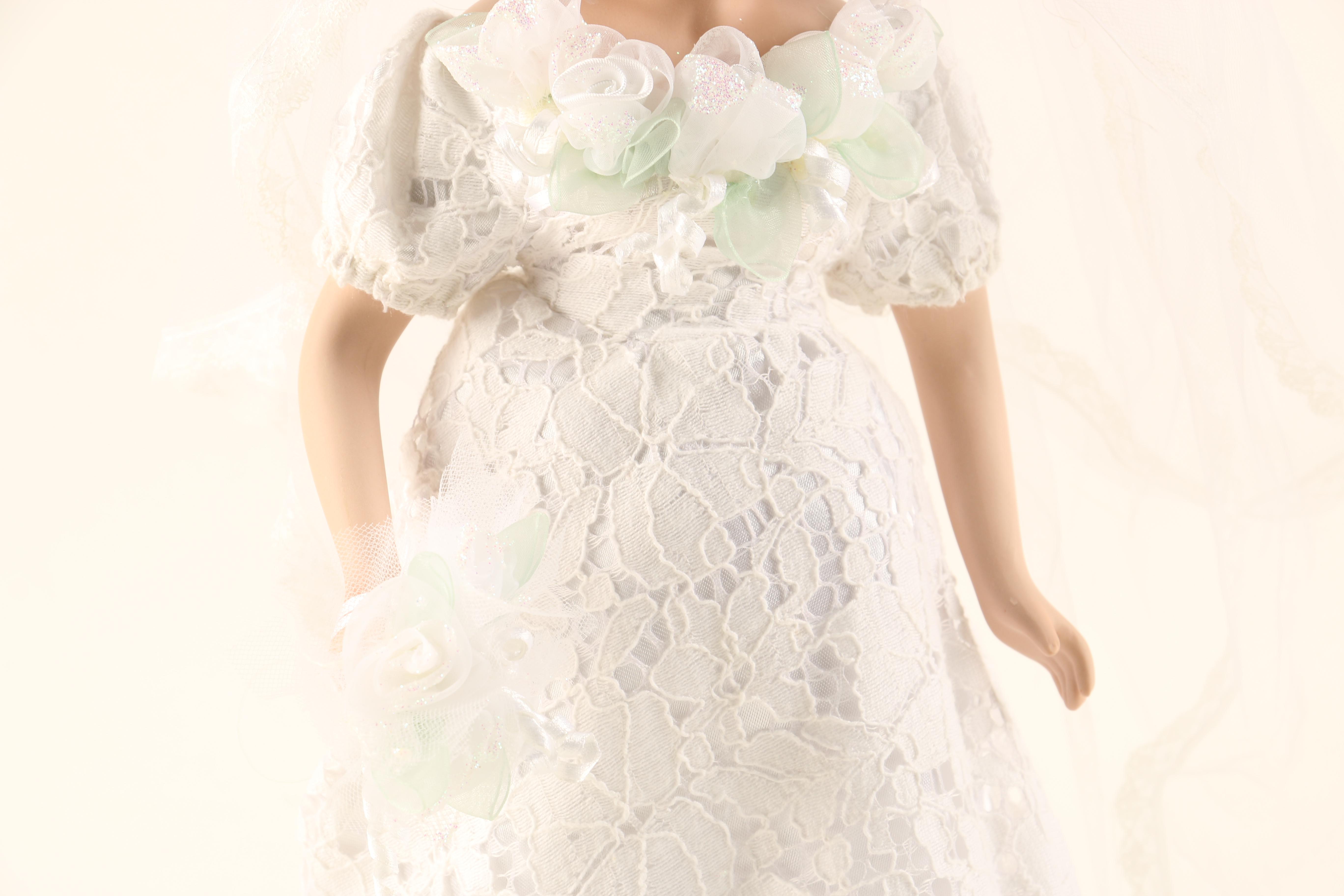 Collection of Three Porcelain Dolls