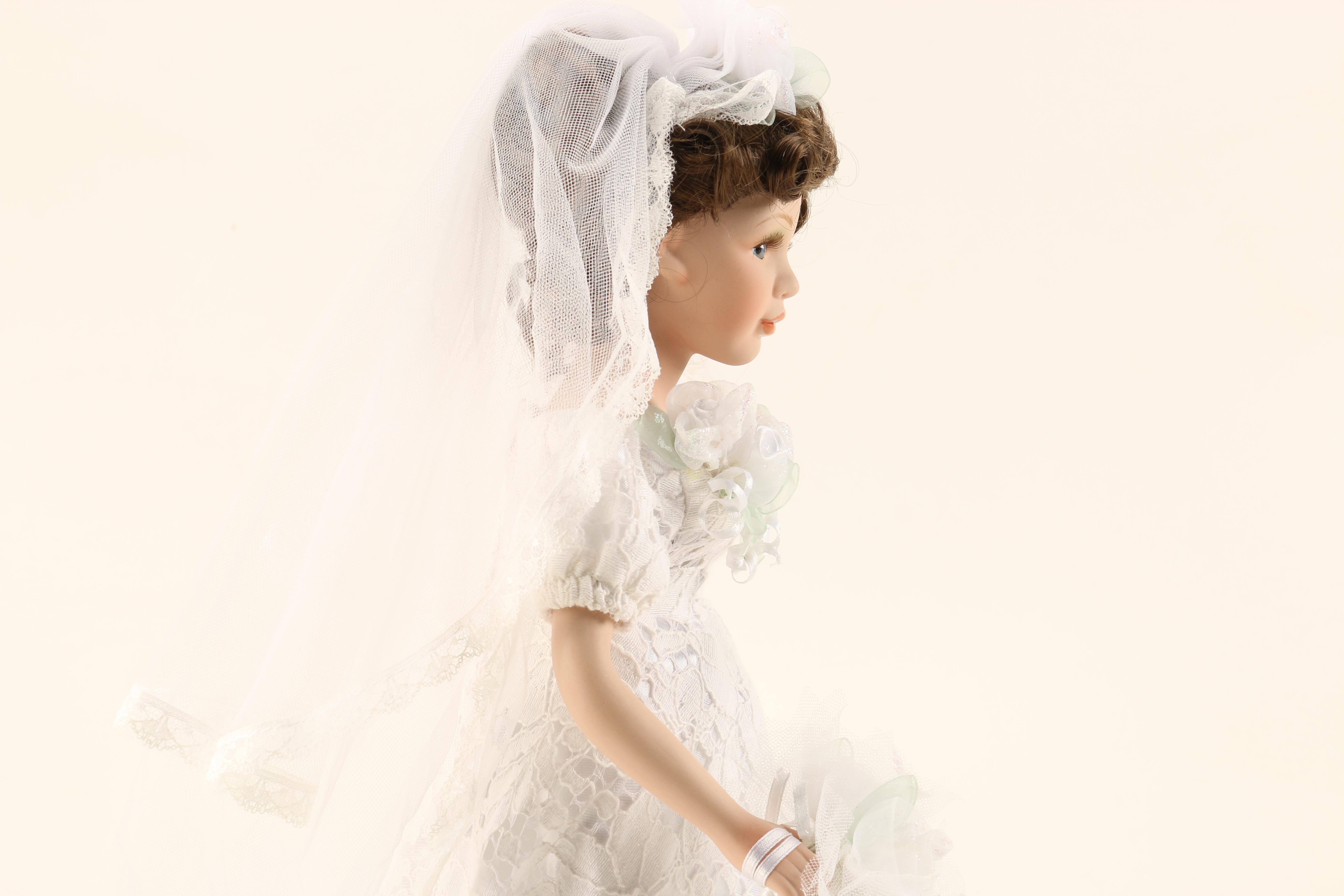 Collection of Three Porcelain Dolls