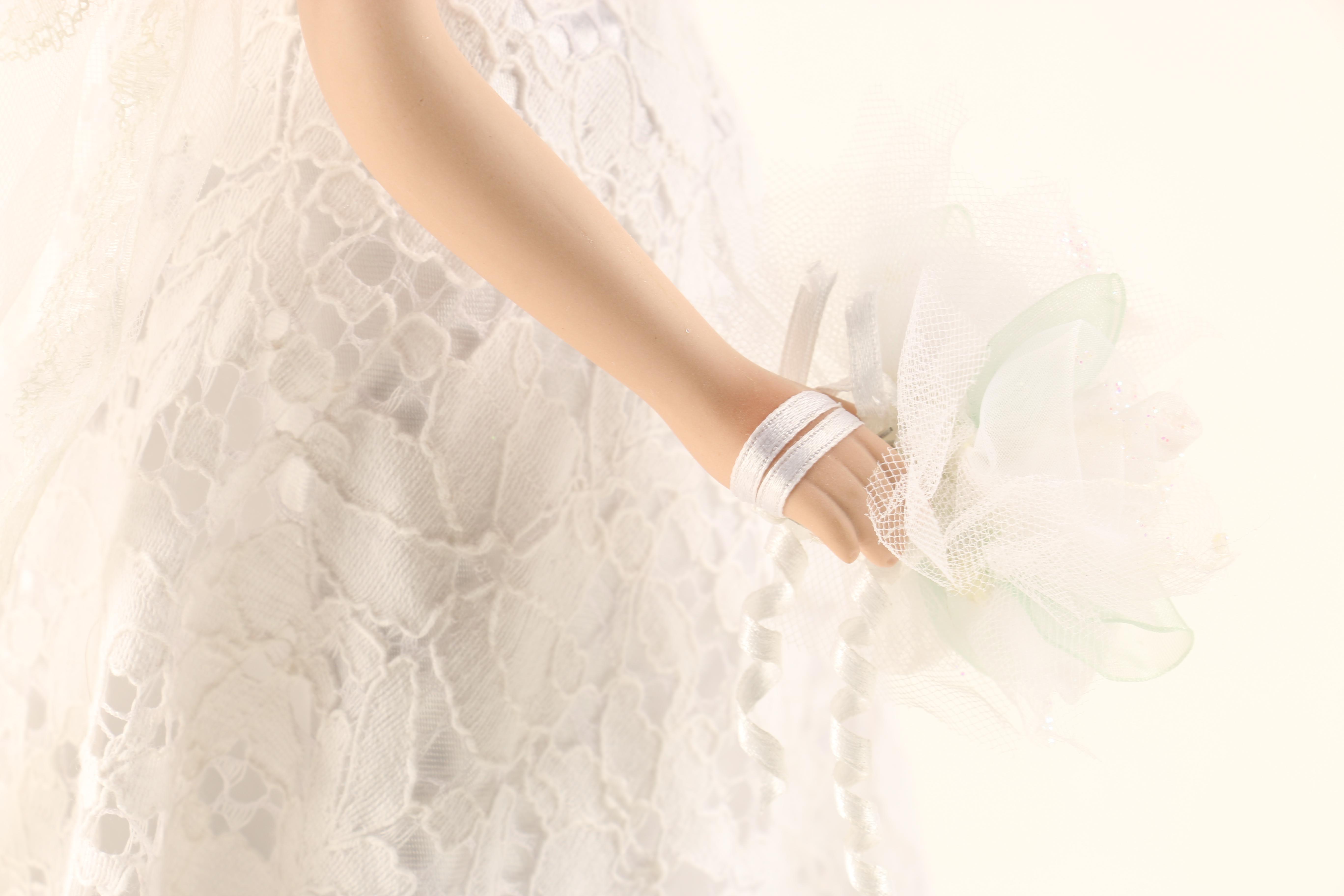 Collection of Three Porcelain Dolls